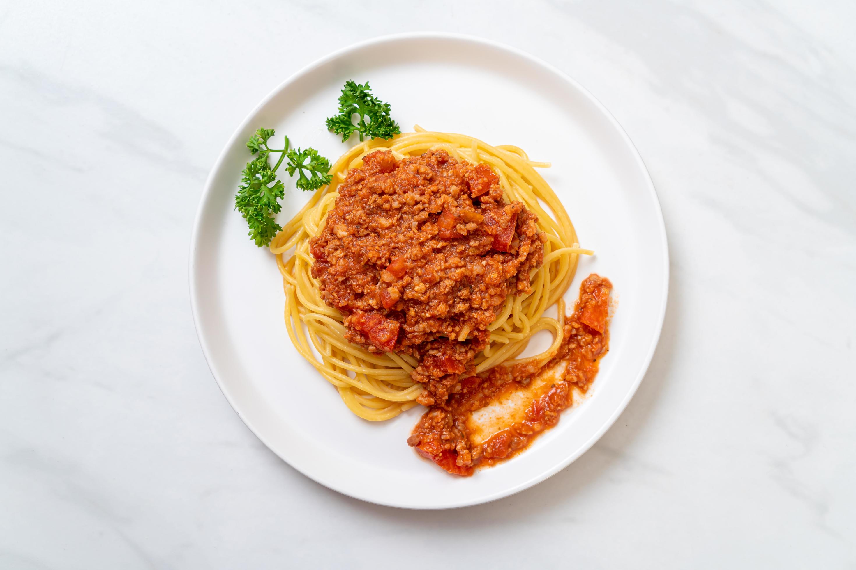 Spaghetti bolognese pork or spaghetti with minced pork tomato sauce – Italian food style Stock Free