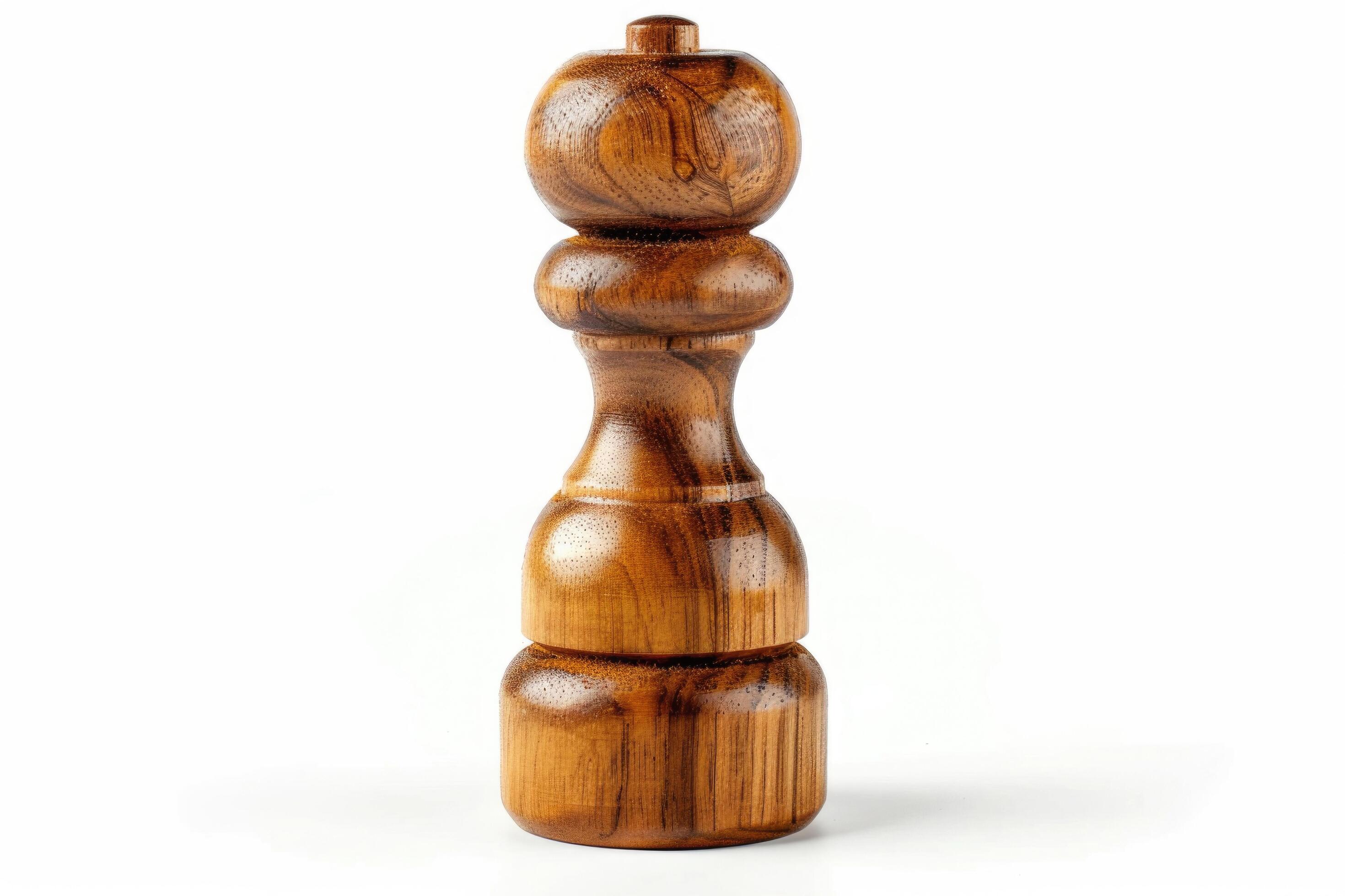 Wooden pepper mill on a white background. Stock Free