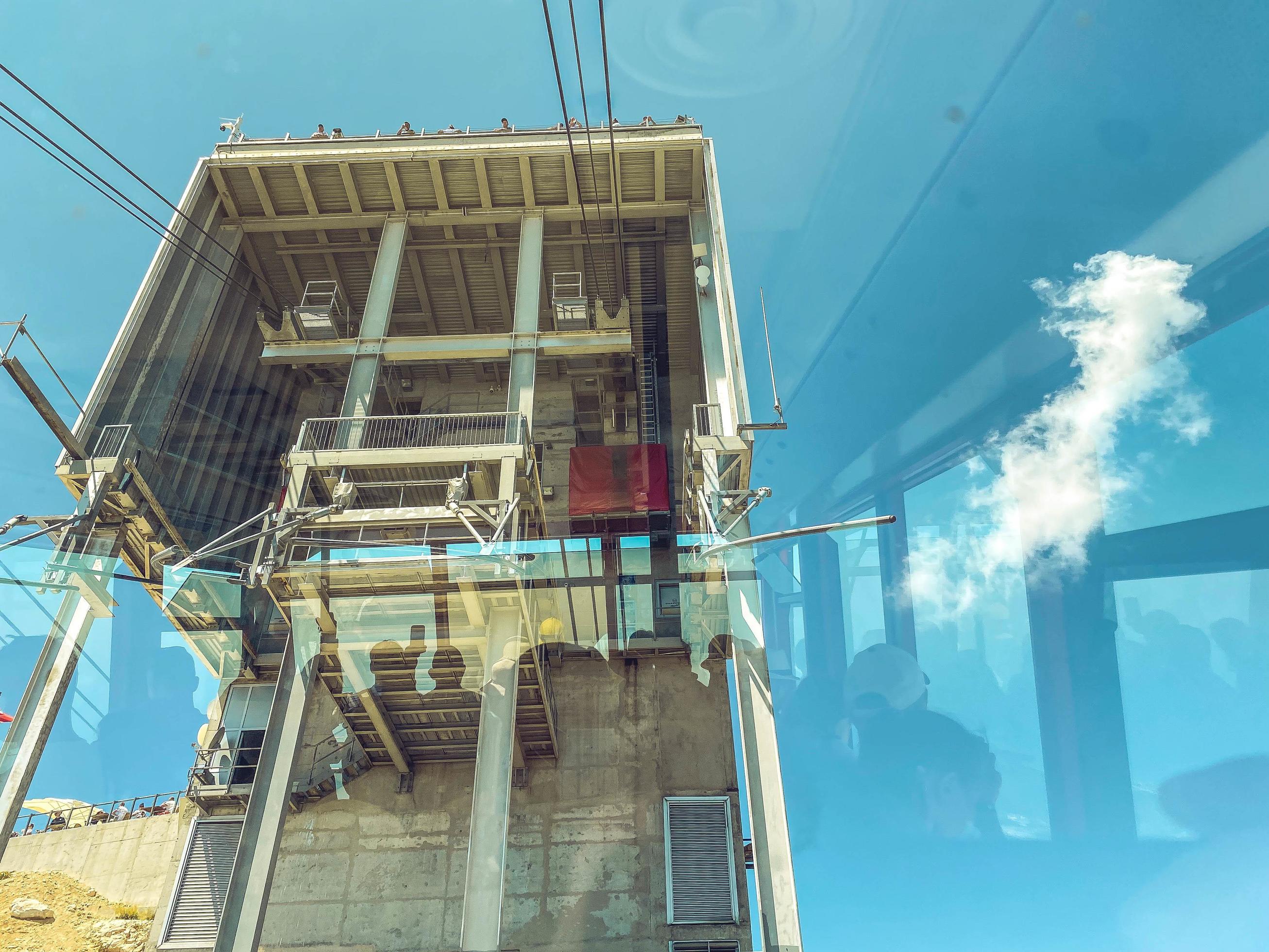 cable car on the mountain. a building for boarding tourists in the cabin before the tour. observation deck on the mountain, observation of nature Stock Free