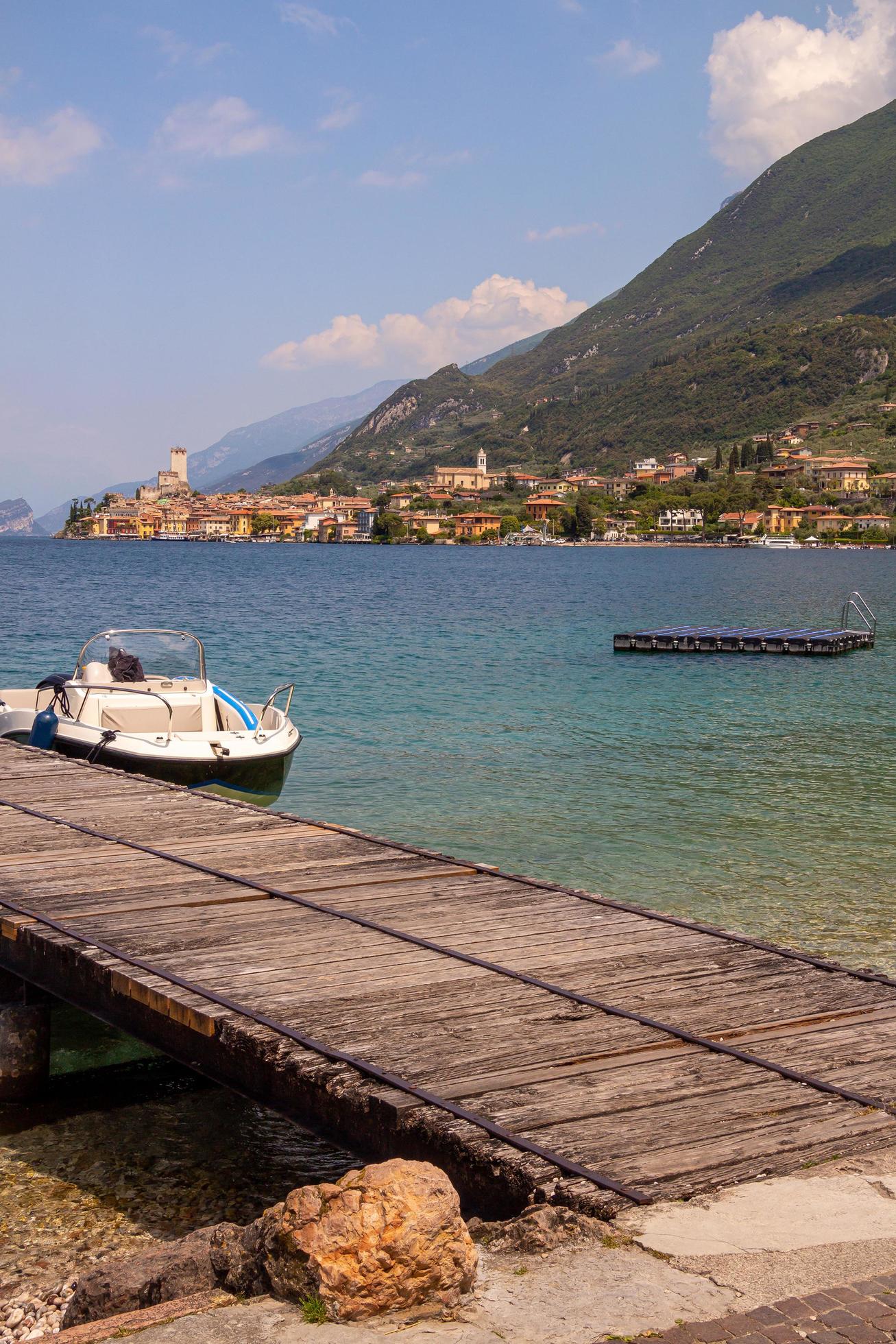 View from lakeside walkway to famous mediterrean town Malcesine, Lago di Garda Garda lake, Italy Stock Free