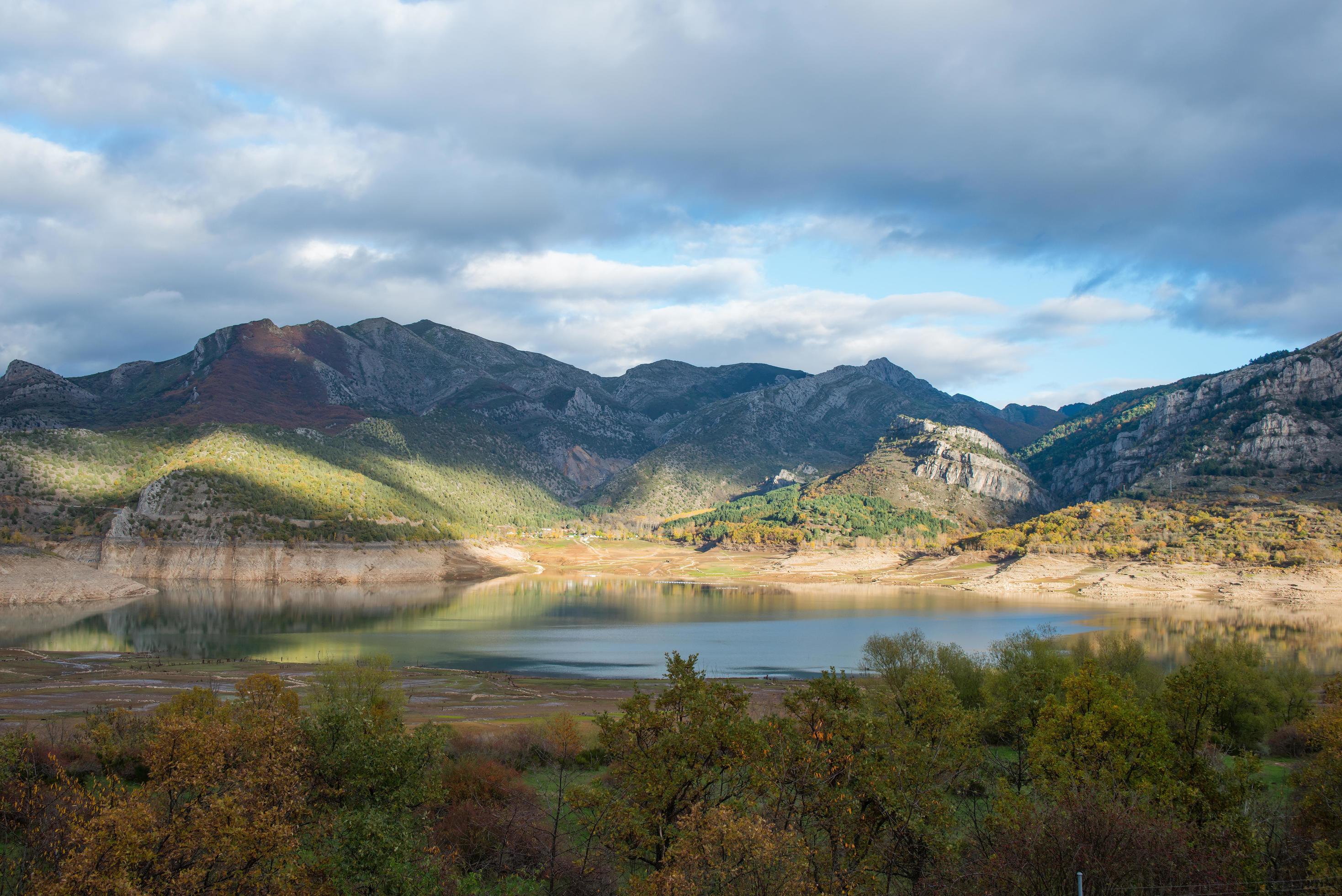 Beautiful landscape in autumn. Water reservoir with low level. Stock Free