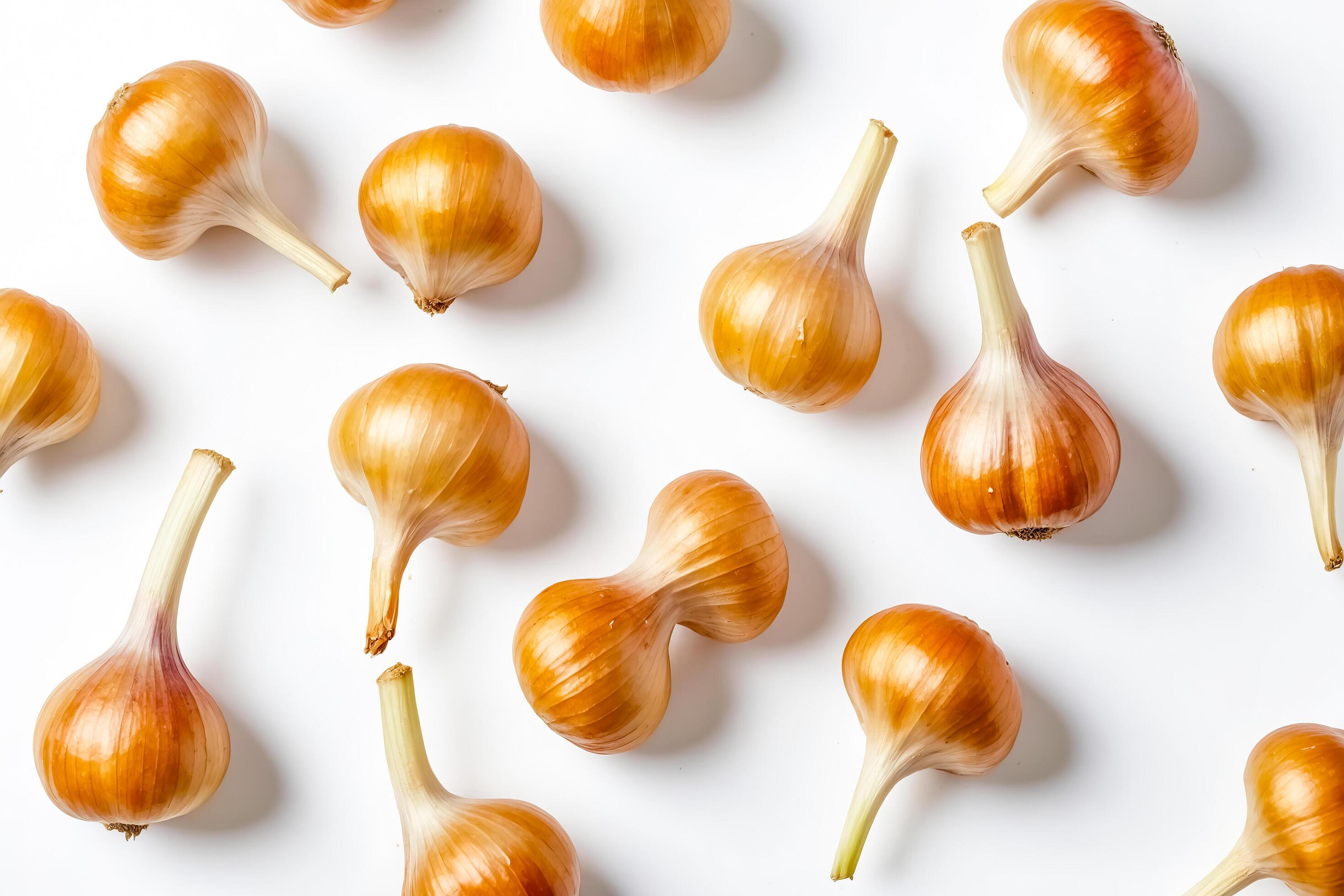 Fresh Yellow Onions on White Background Stock Free