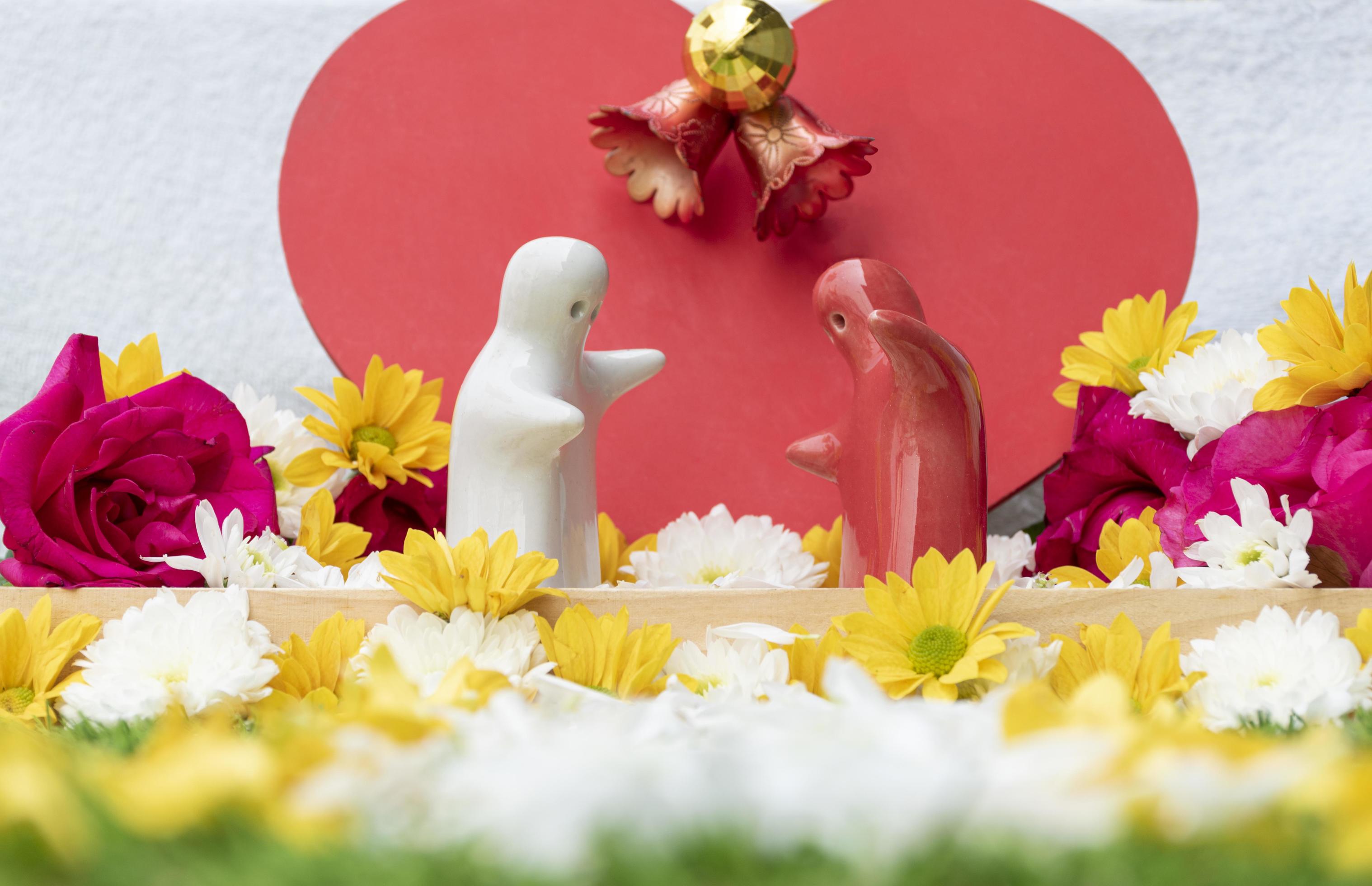 Mock up couple hugging at simulated wedding decorated with roses and flowers. Valentine day concept Stock Free