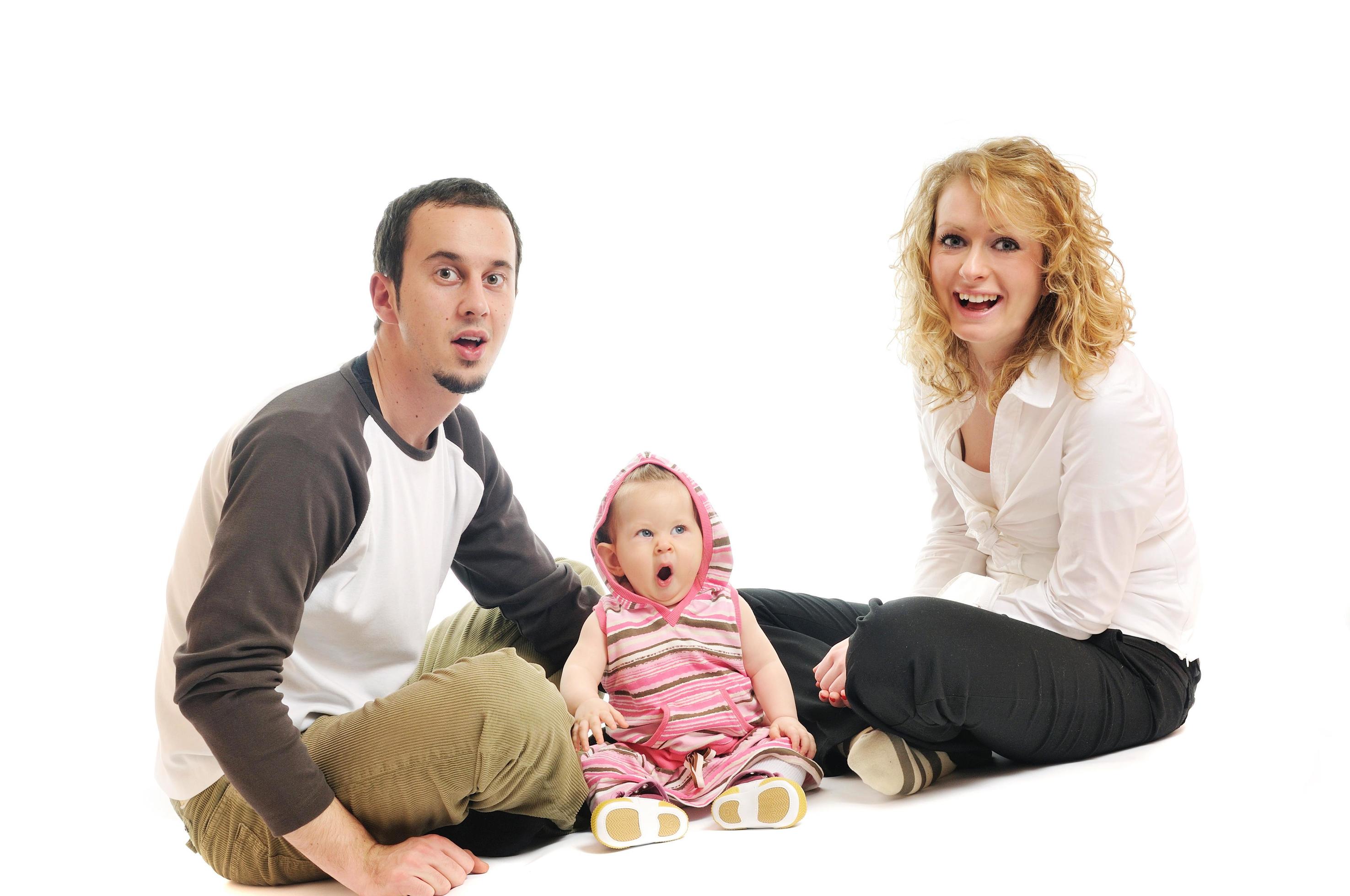 happy young family together in studio Stock Free