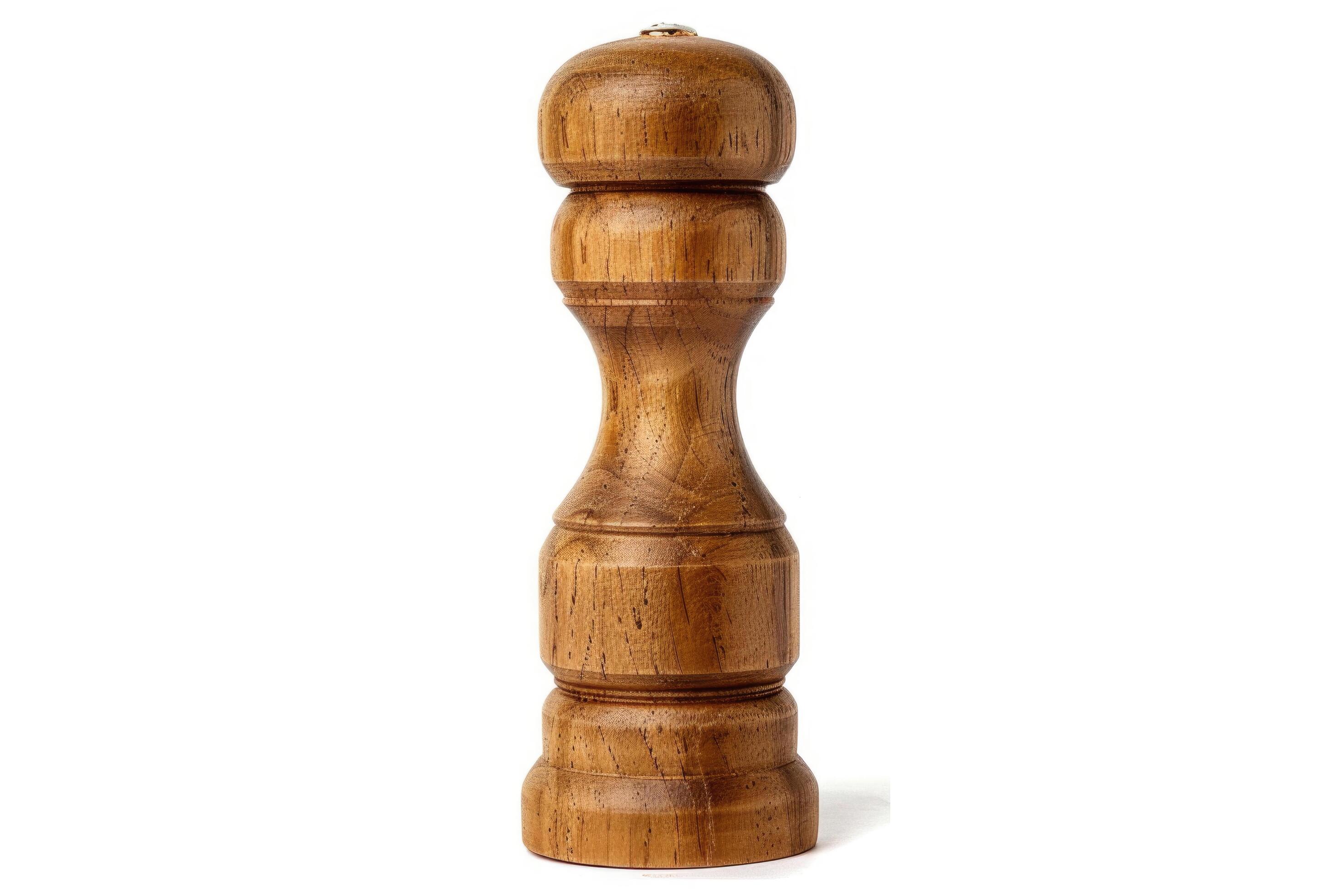 Wooden pepper mill on a white background. Stock Free