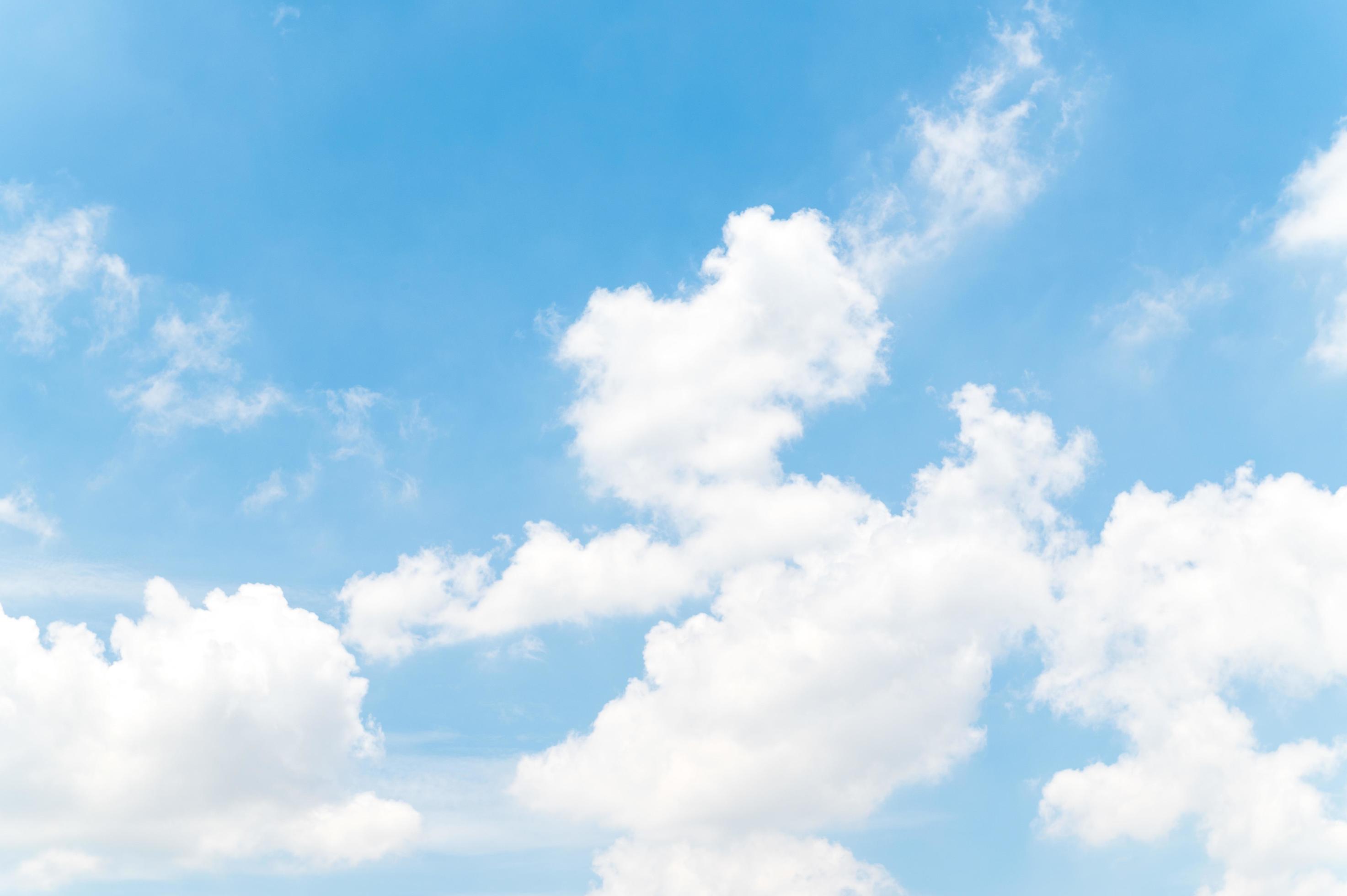 Beautiful white fluffy clouds in blue sky. Nature background from white cloud in sunny day Stock Free