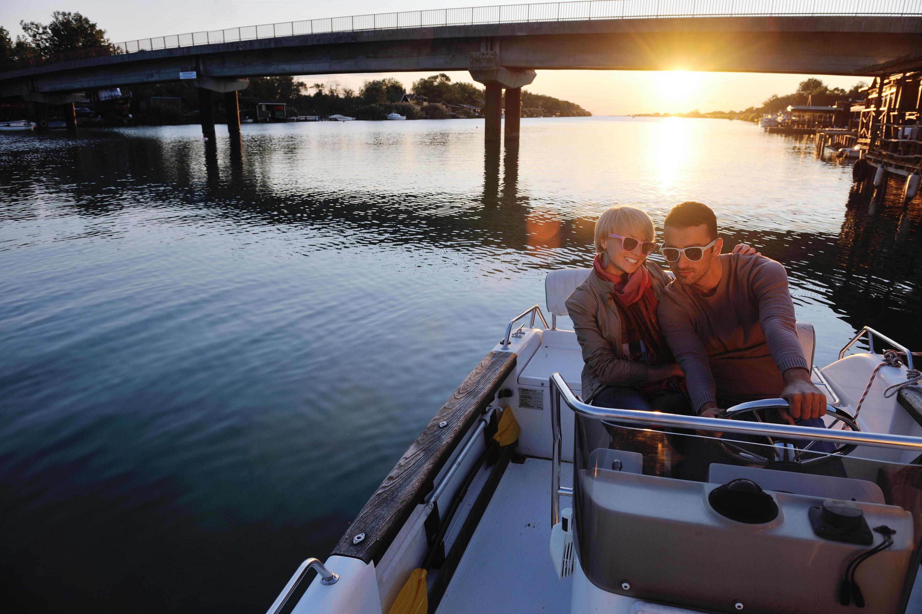 couple in love have romantic time on boat Stock Free