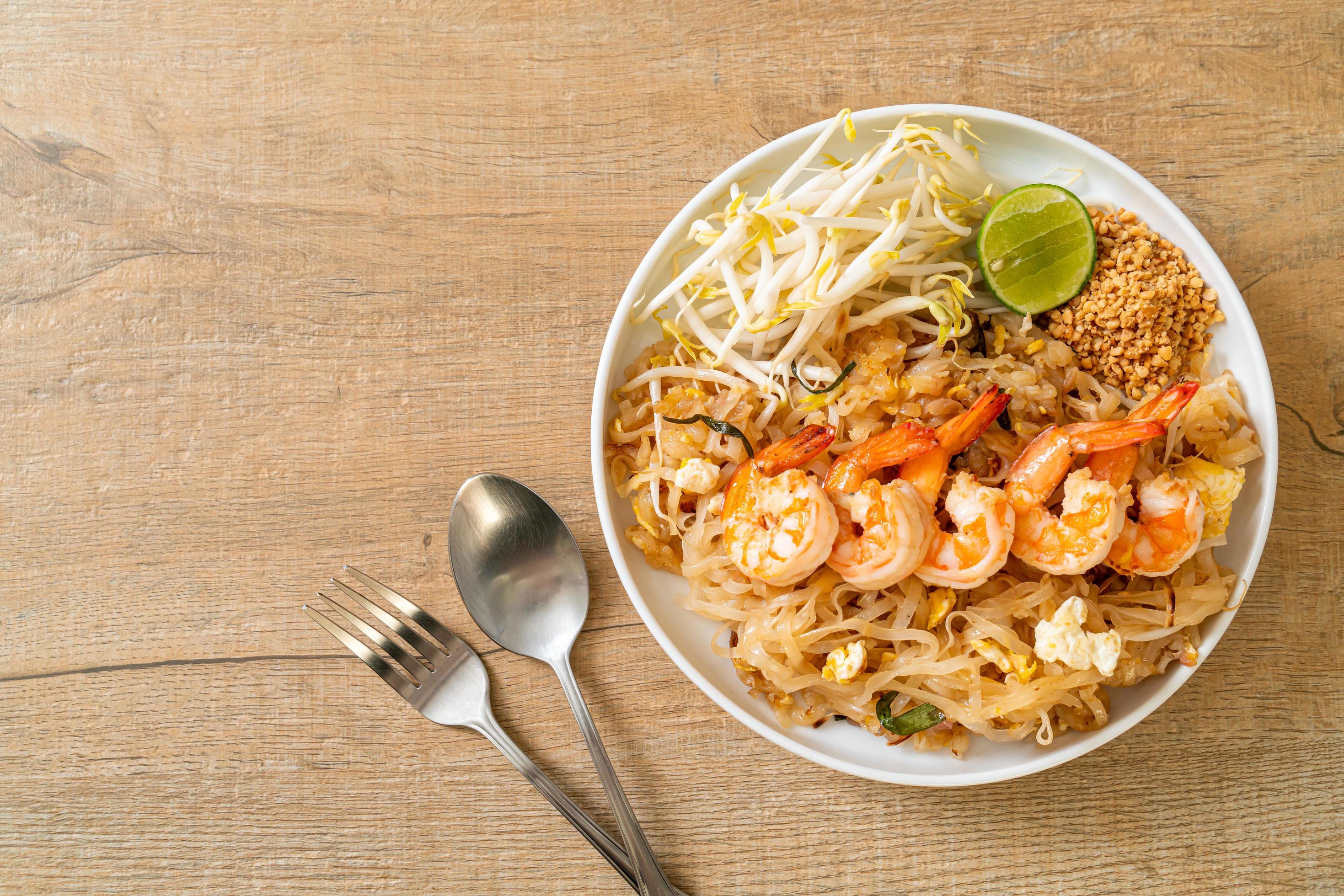 Stir-fried noodles with shrimp and sprouts or Pad Thai – Asian food style Stock Free