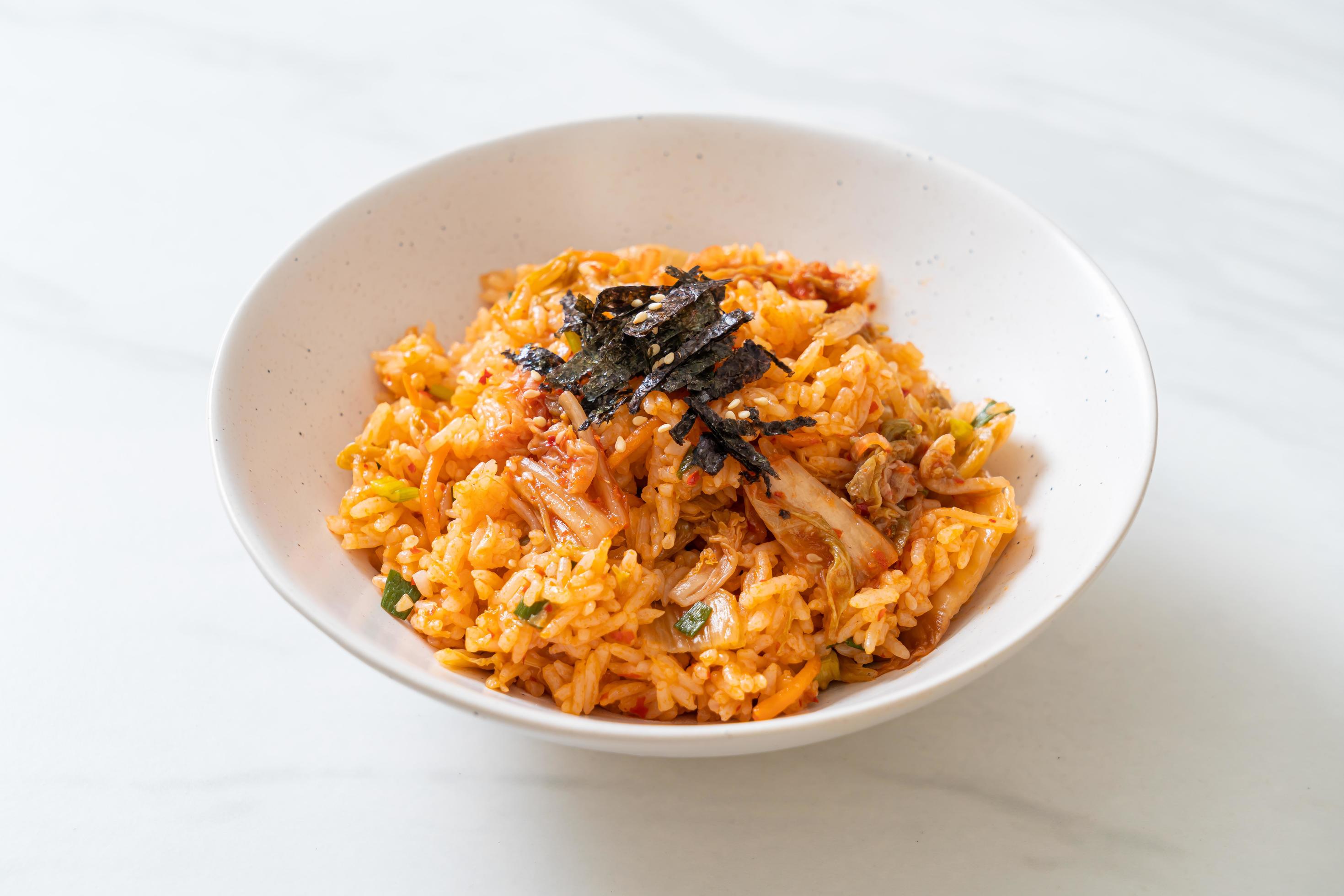 Kimchi fried rice with seaweed and white sesame – Korean food style Stock Free