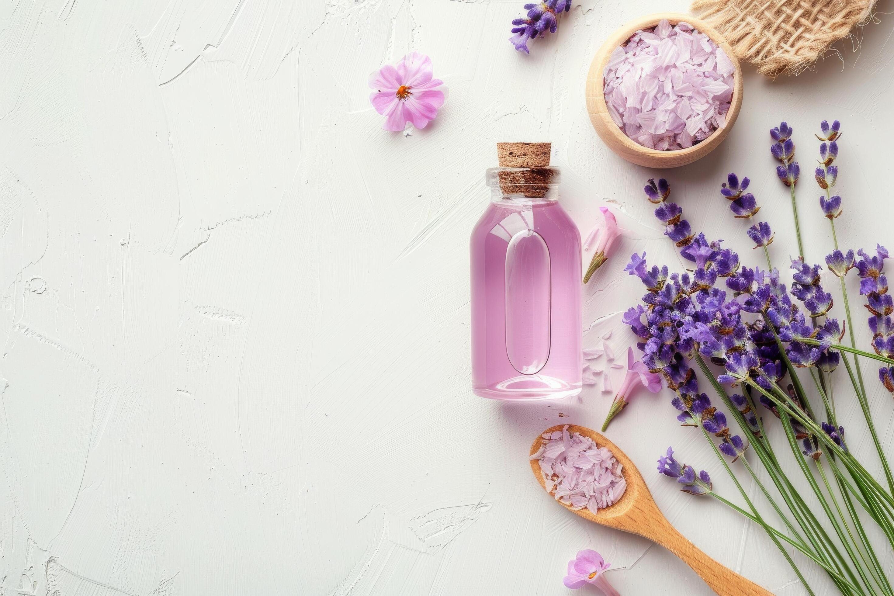 Lavender Essential Oil and Flowers on White Background Stock Free