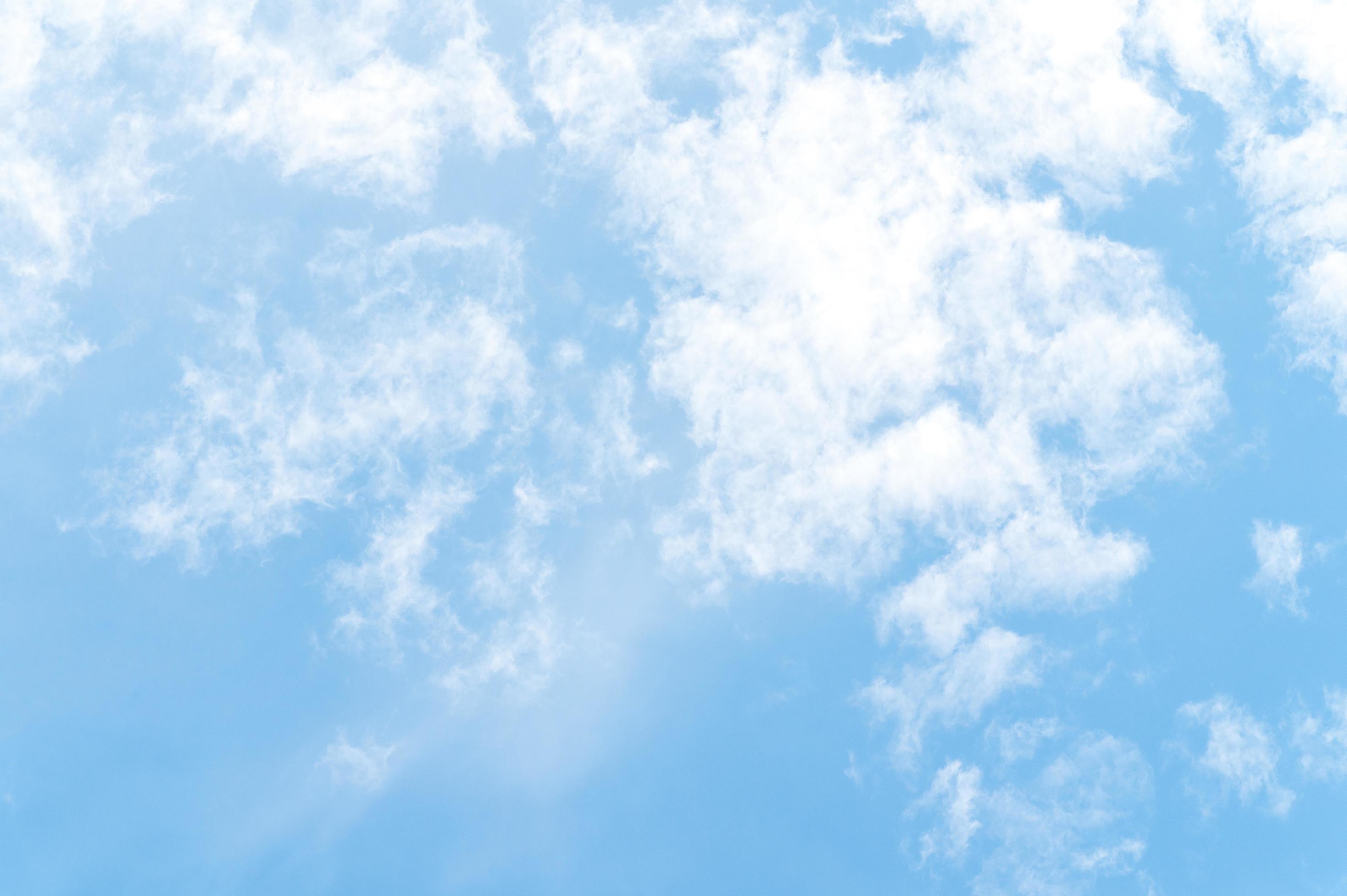 Beautiful white fluffy clouds in blue sky. Nature background from white cloud in sunny day Stock Free