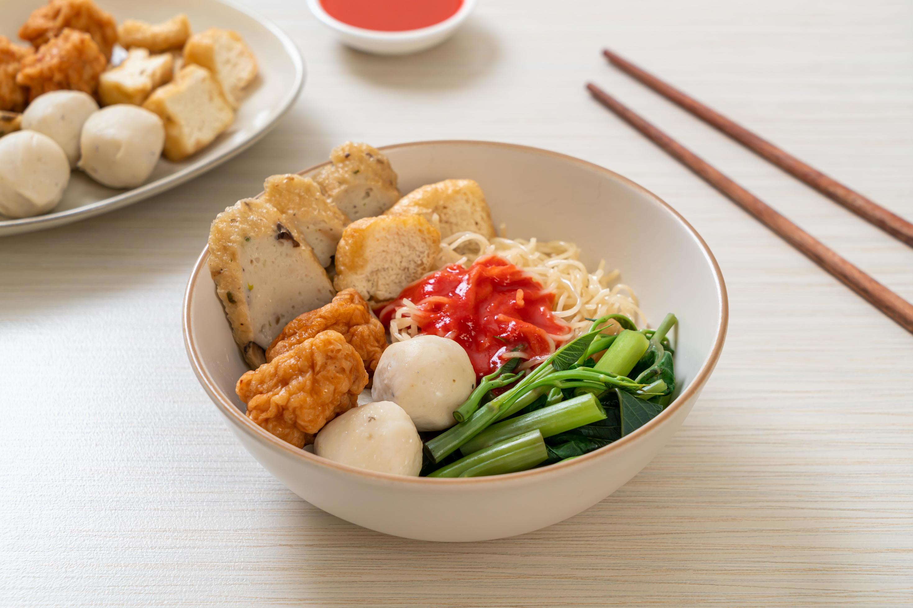 Egg noodles with fish balls and shrimp balls in pink sauce, Yen Ta Four or Yen Ta Fo – Asian food style Stock Free