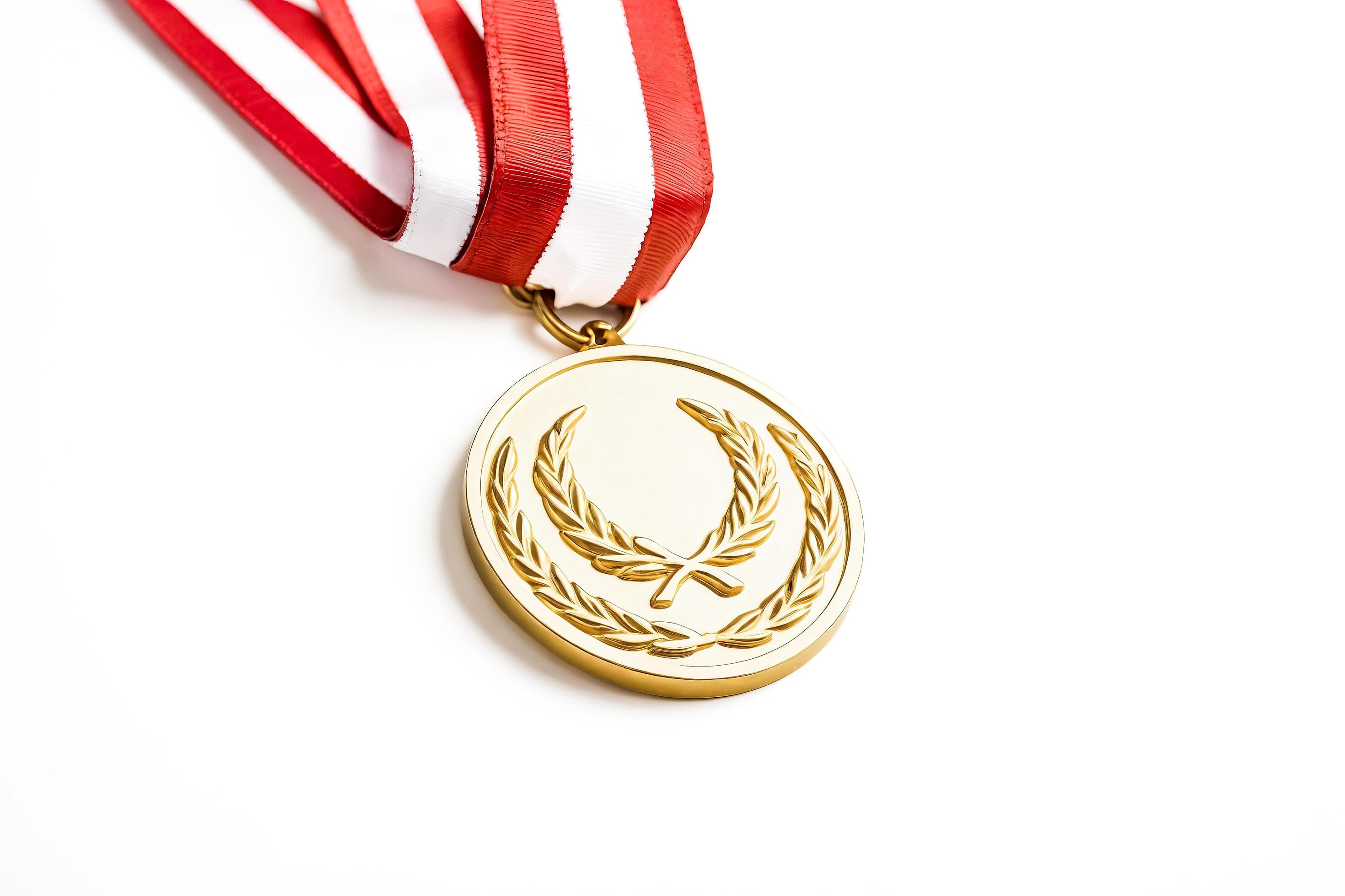 Gold medal with red and white ribbon isolated on white background Stock Free