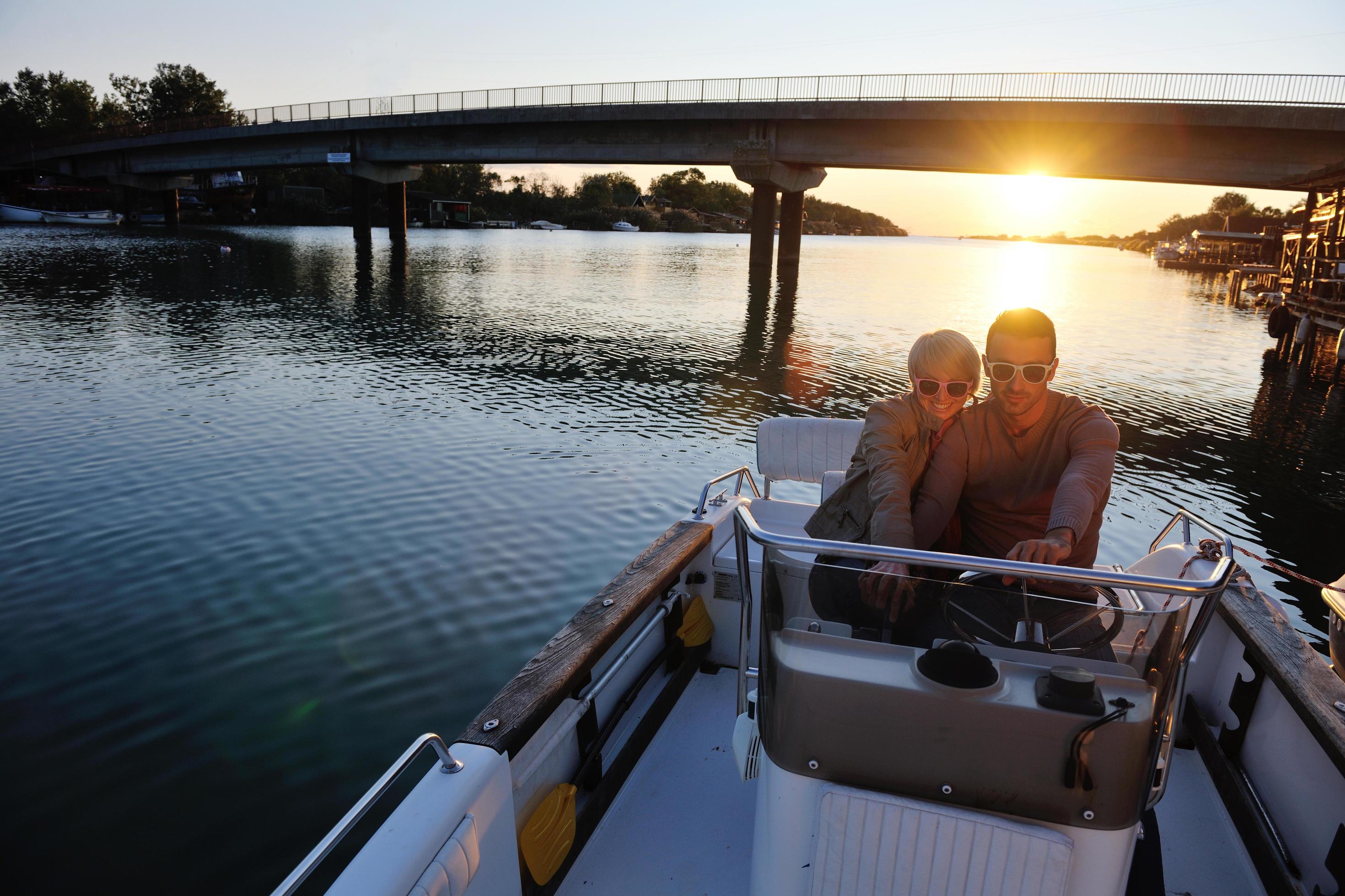 couple in love have romantic time on boat Stock Free