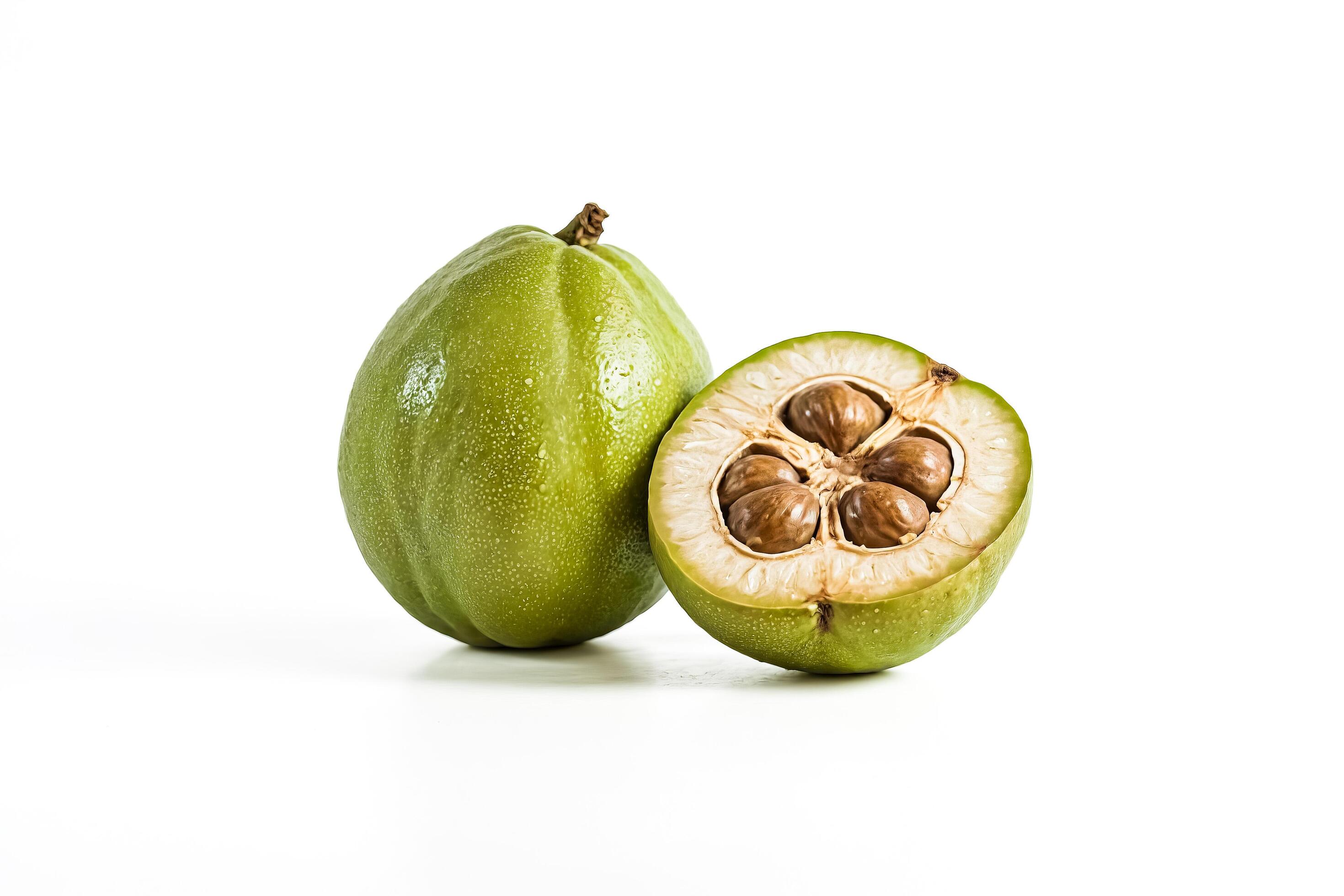 Green Nut with Five Seeds Cut in Half on White Background Stock Free