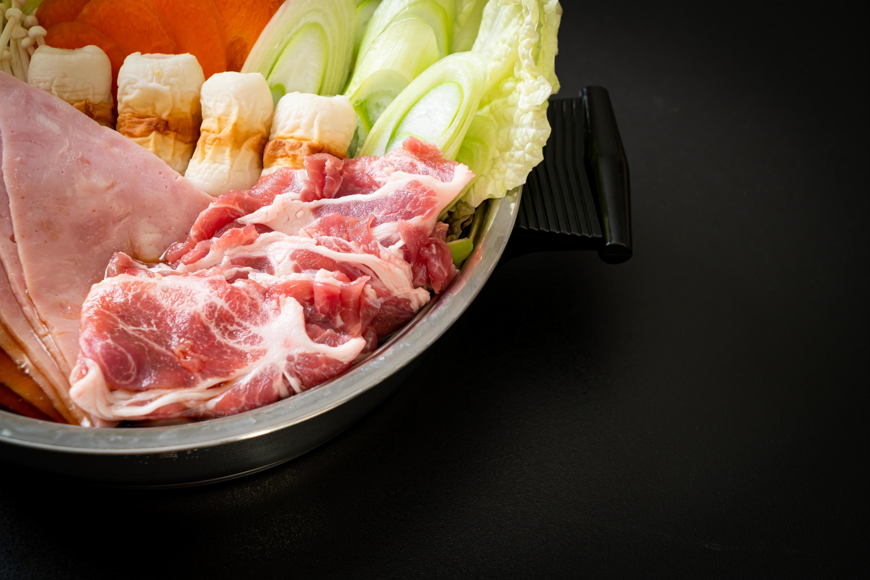 
									Sukiyaki or shabu hot pot soup with raw meat and vegetables – Japanese food style Stock Free