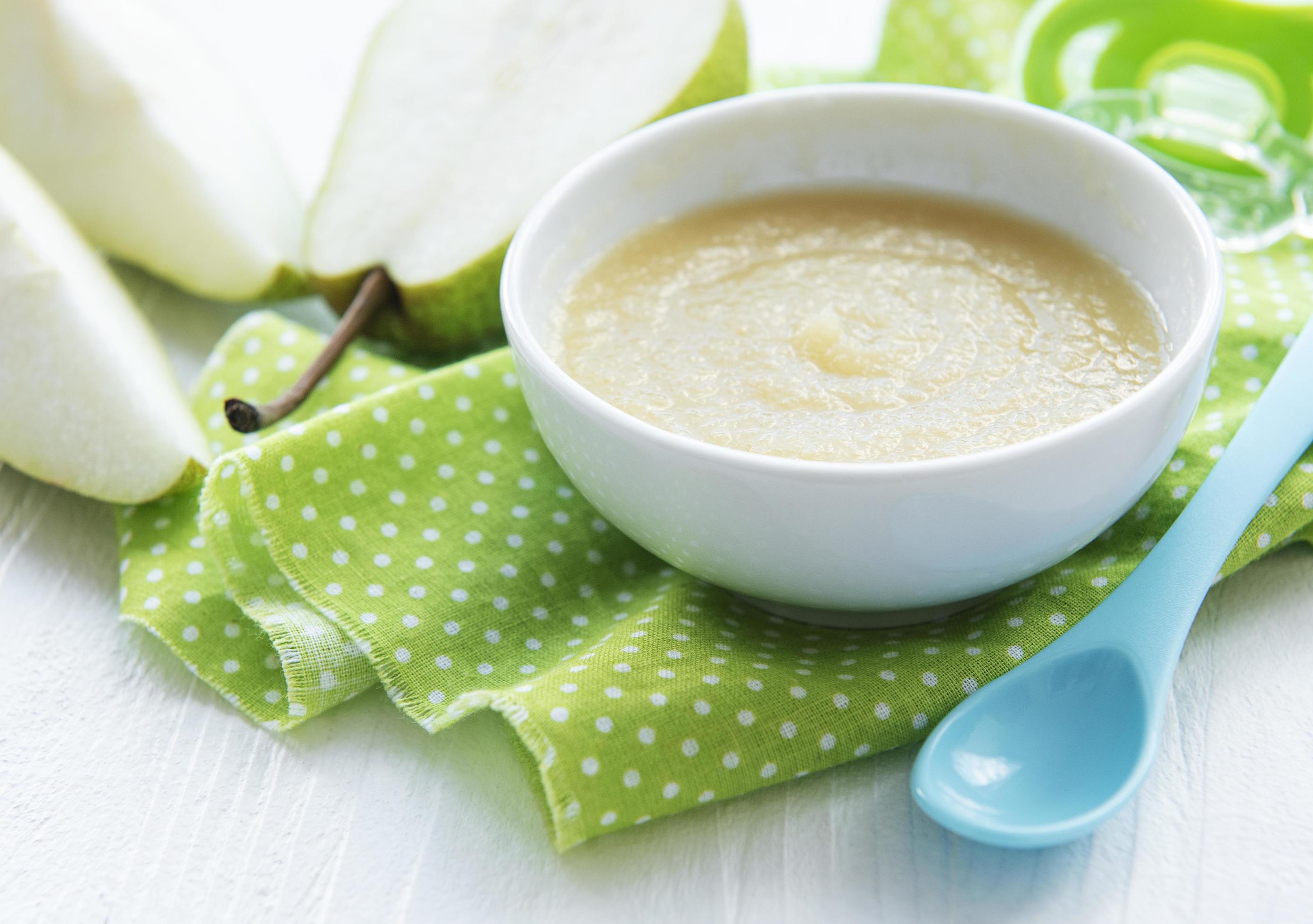 Bowl with fruit baby food and pears Stock Free