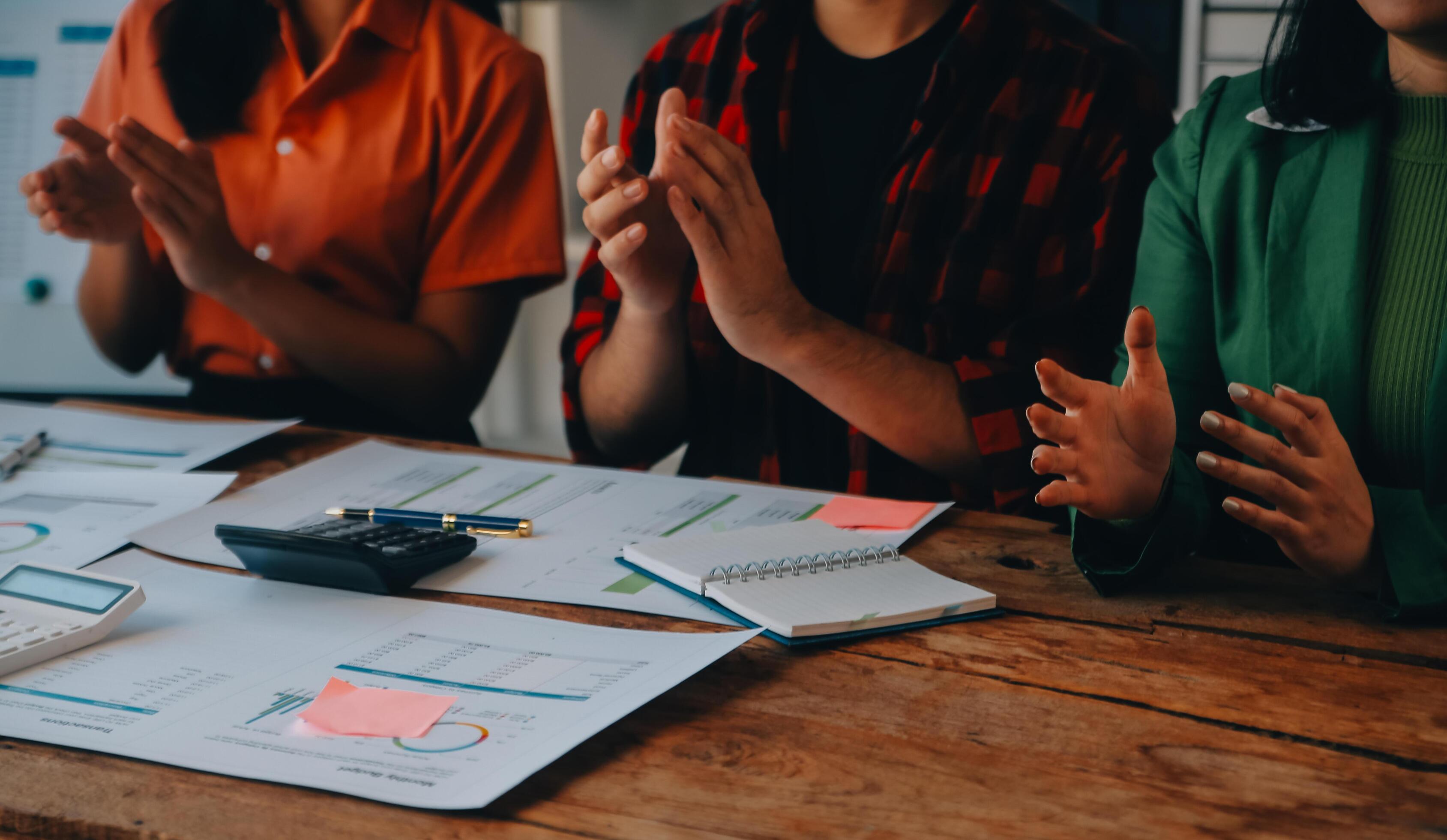 
									Cheerful business colleagues applauding in meeting at coworking office Stock Free