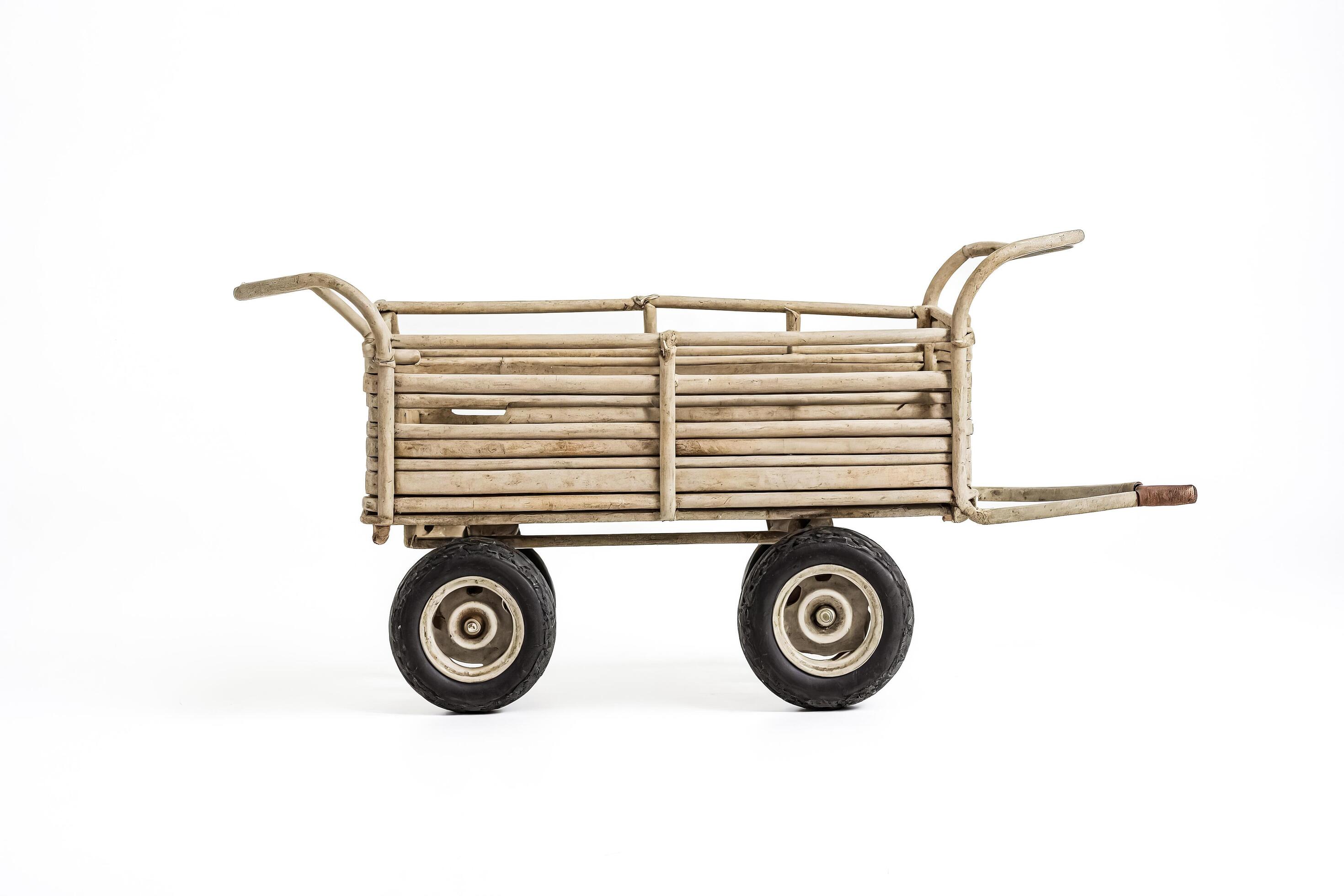 Old wooden toy wagon on a white background Stock Free