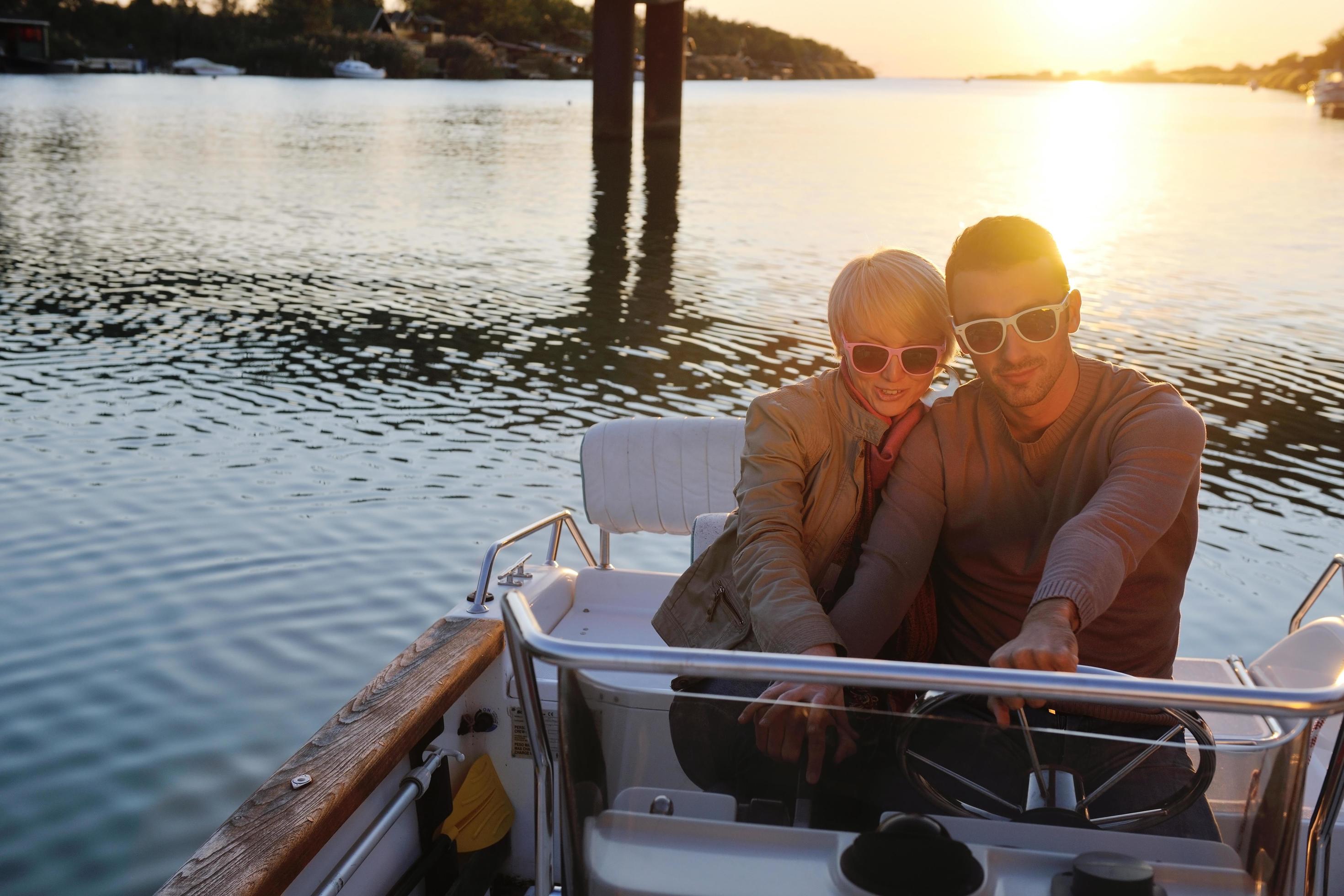 couple in love have romantic time on boat Stock Free