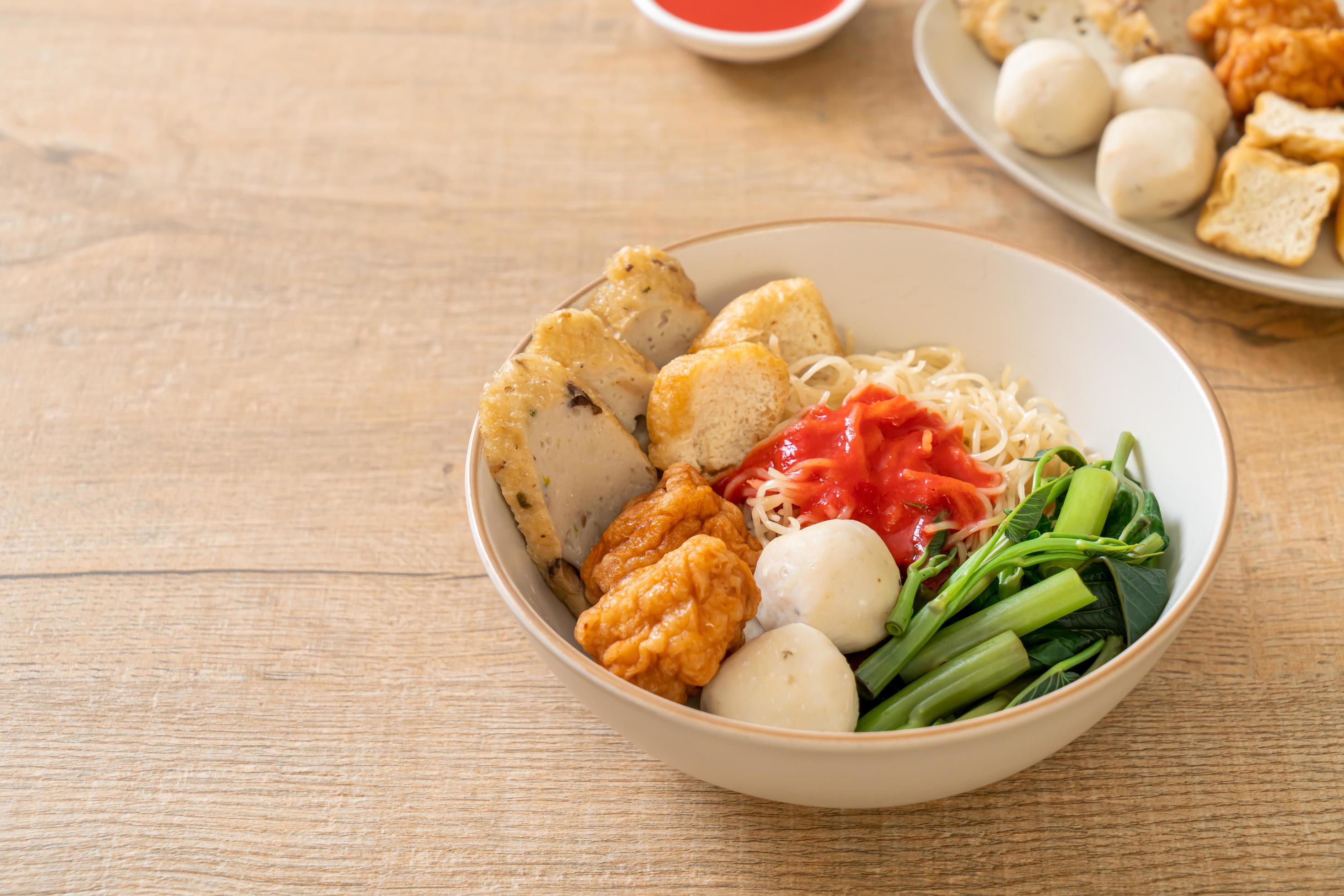 Egg noodles with fish balls and shrimp balls in pink sauce, Yen Ta Four or Yen Ta Fo – Asian food style Stock Free