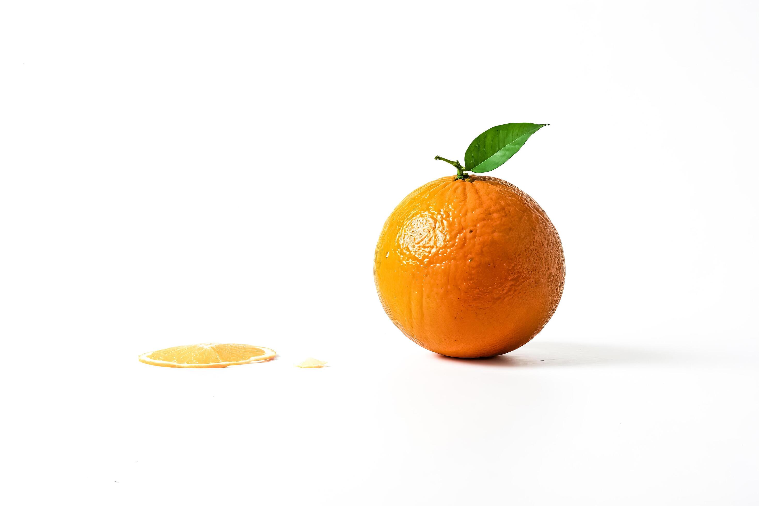 Whole Orange and Slice on White Background Stock Free