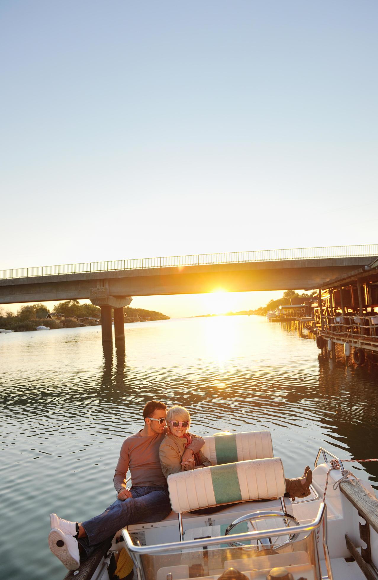 couple in love have romantic time on boat Stock Free