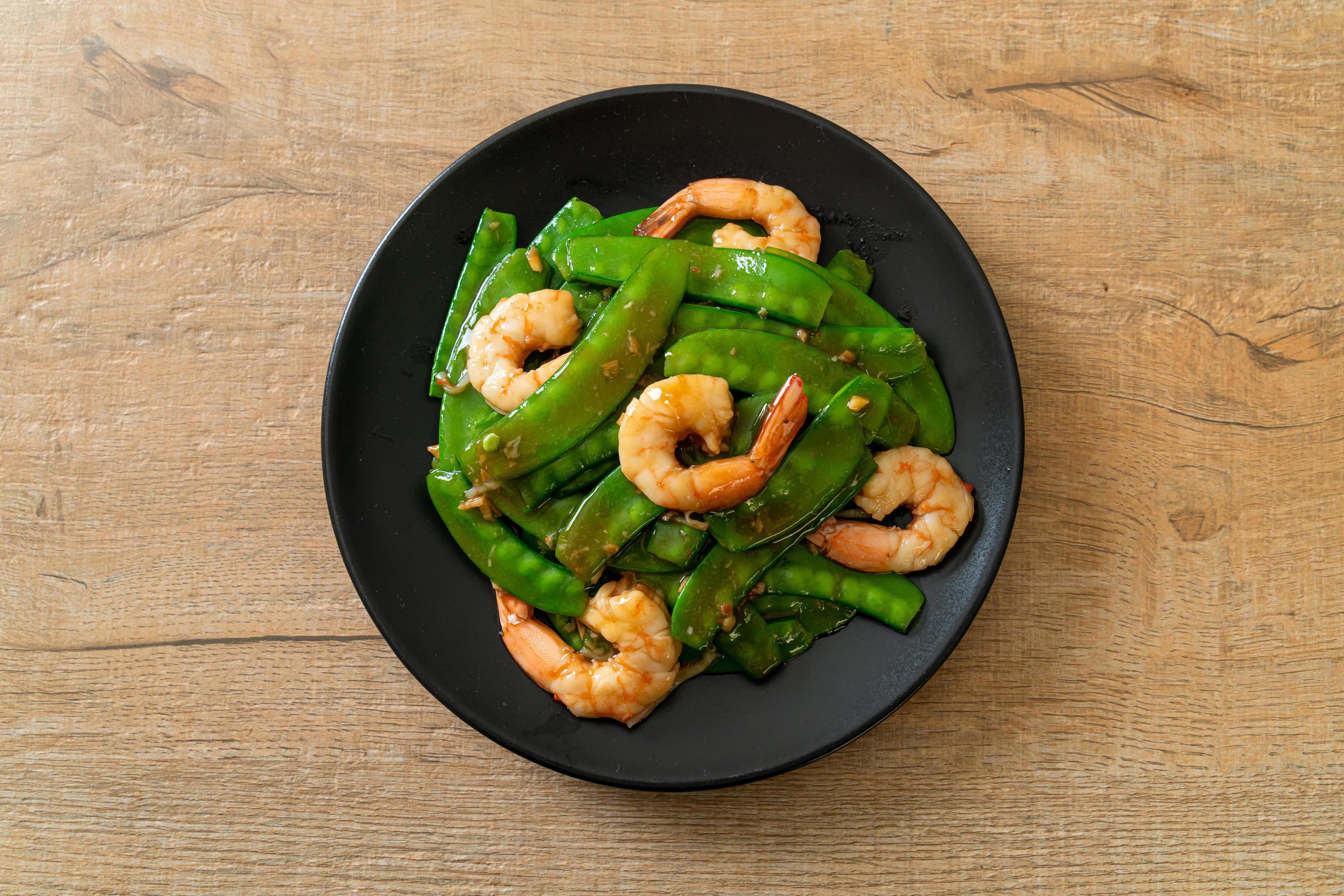 Stir-fried green peas with shrimp – homemade food style Stock Free