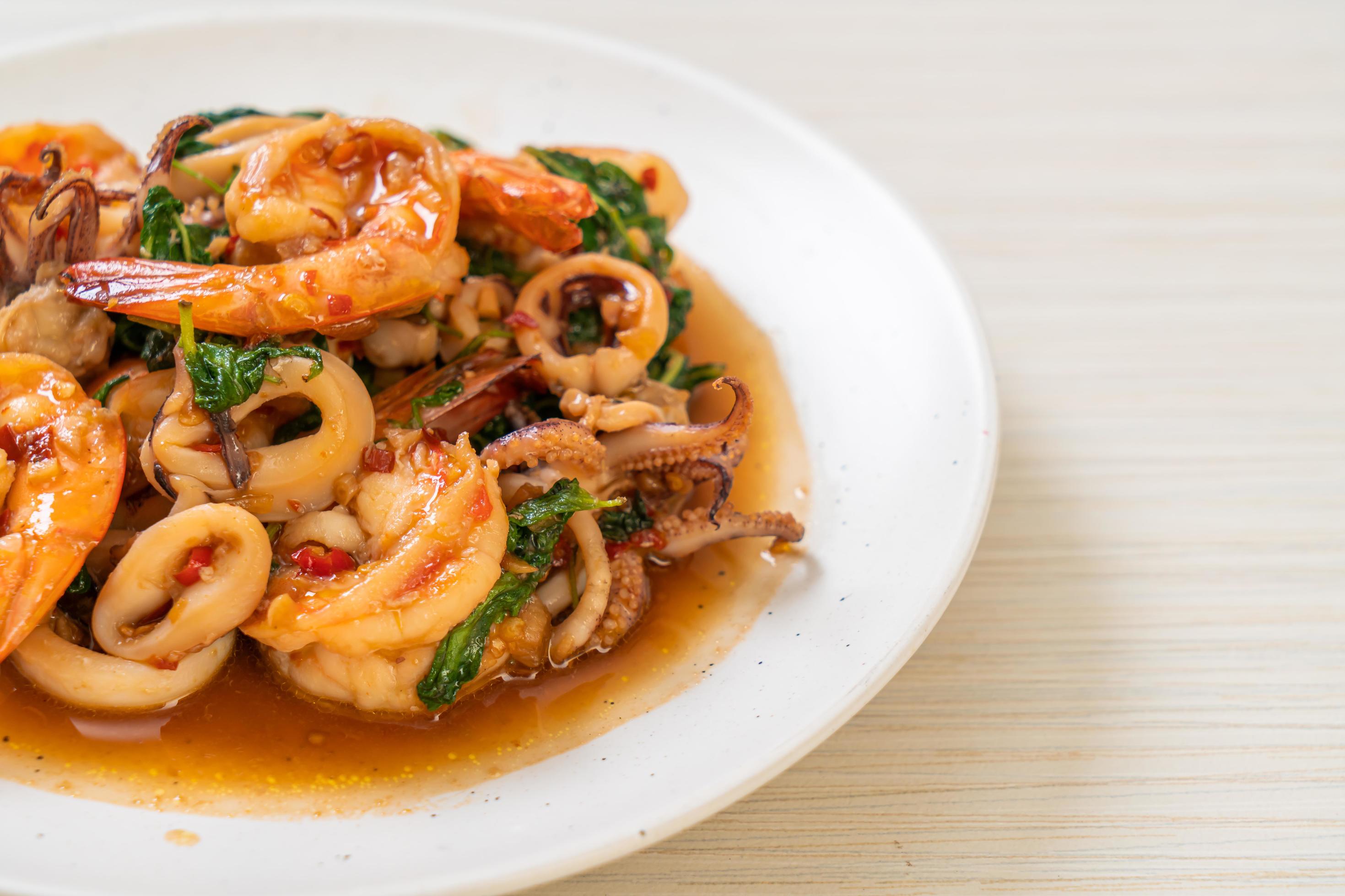 
									Rice and stir-fried seafood, shrimp and squid, with Thai basil – Asian food style Stock Free