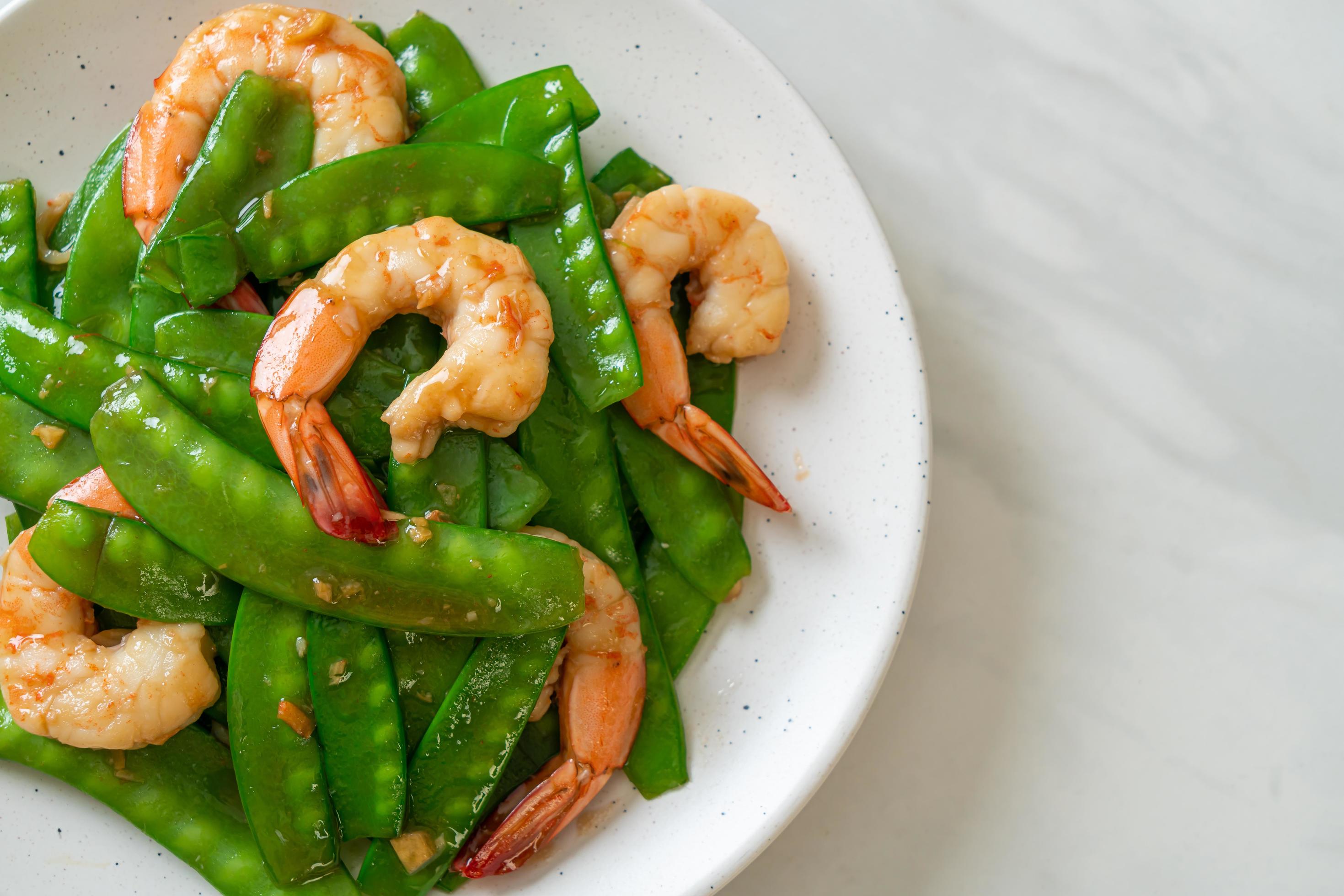 
									Stir-fried green peas with shrimp – homemade food style Stock Free