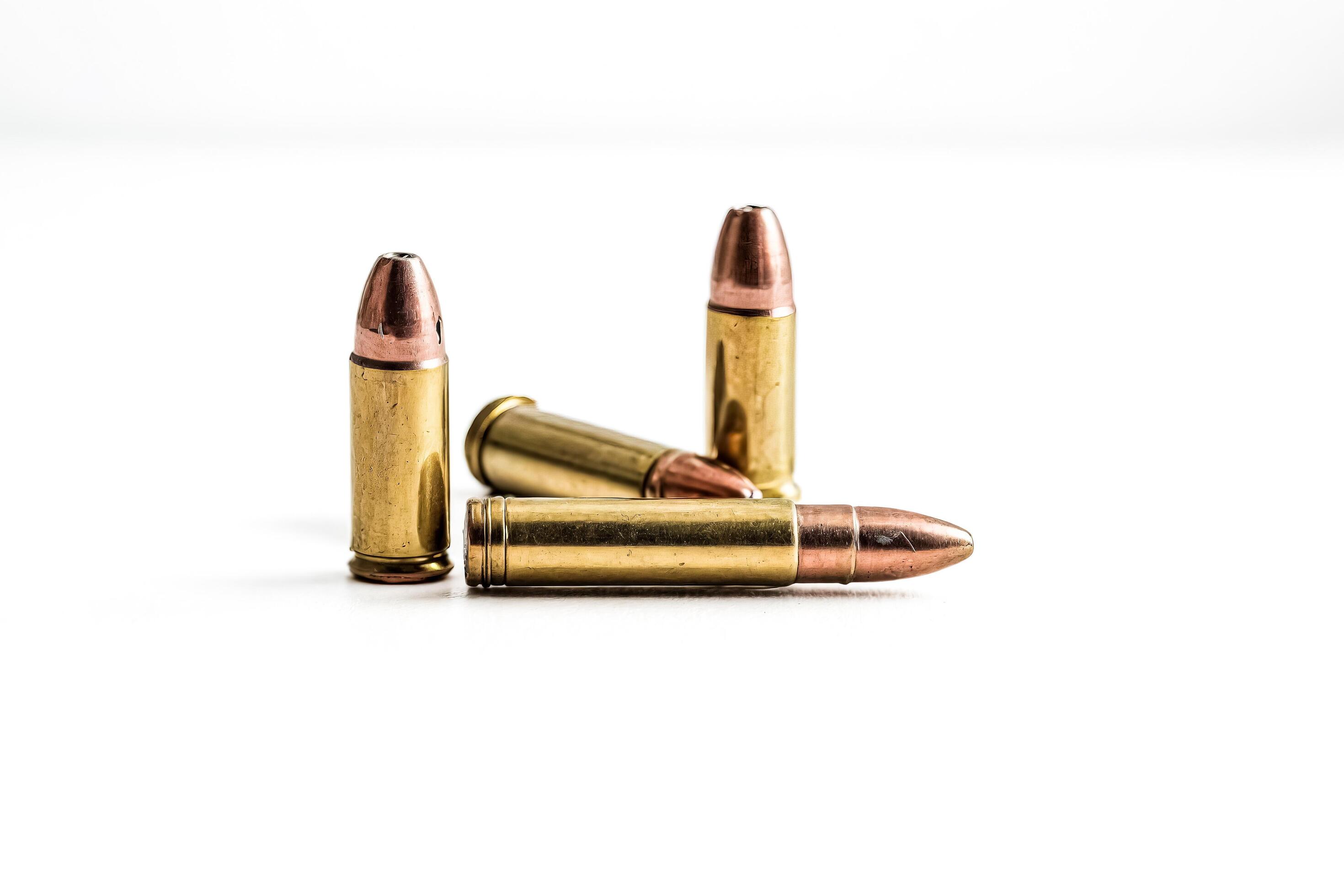 Three Bullets on a White Background Stock Free