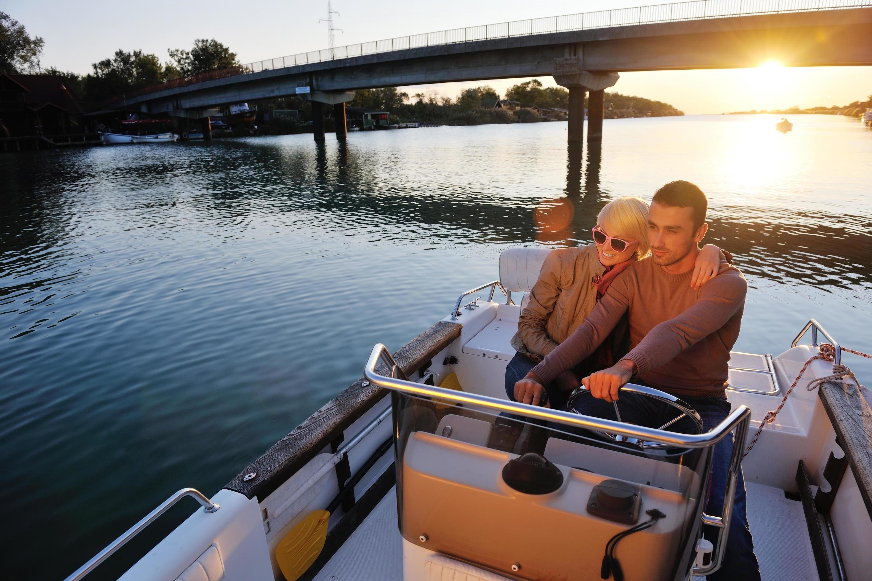 couple in love have romantic time on boat Stock Free