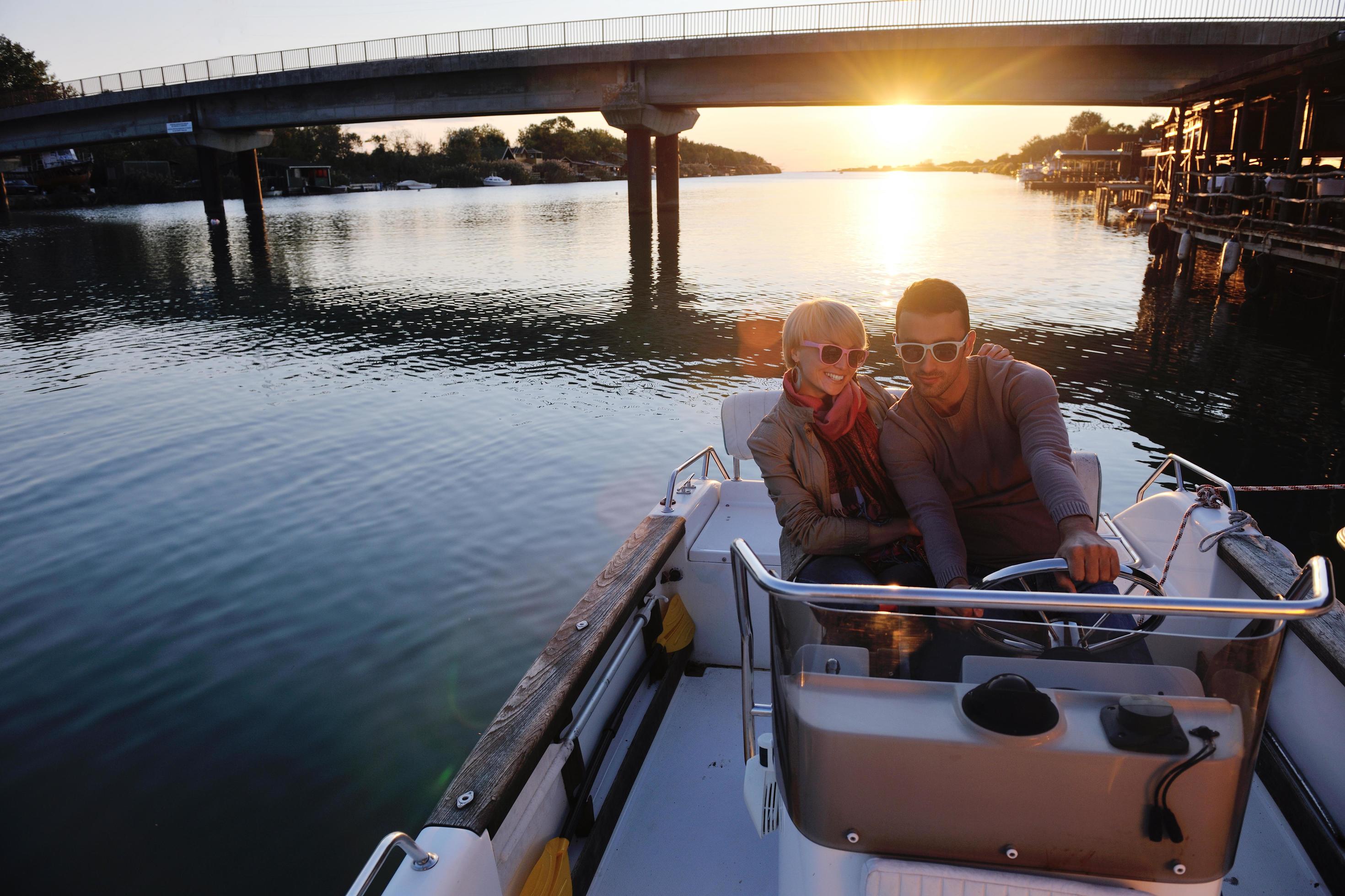 couple in love have romantic time on boat Stock Free