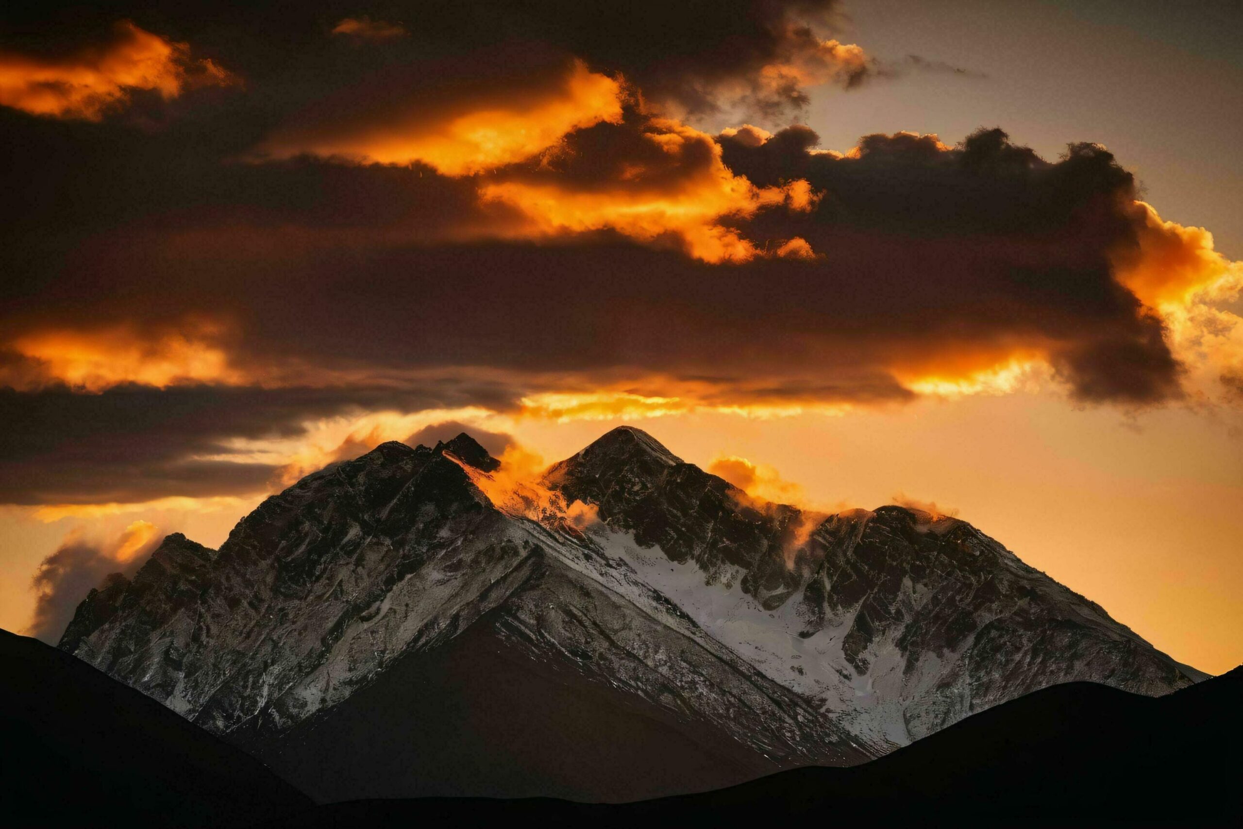 Dramatic Sunset in Mountain Peaks Free Photo