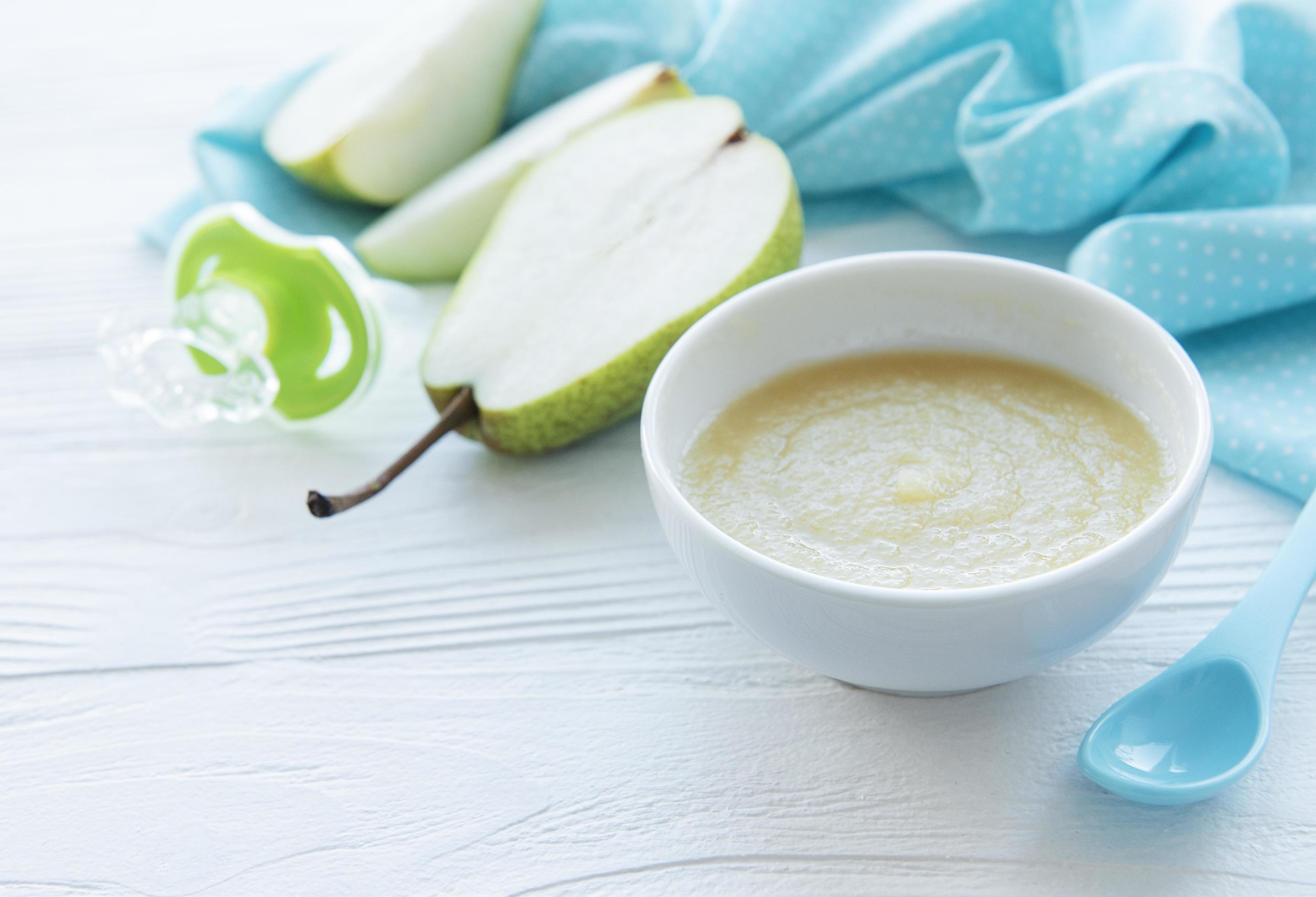 Bowl with fruit baby food and pears Stock Free