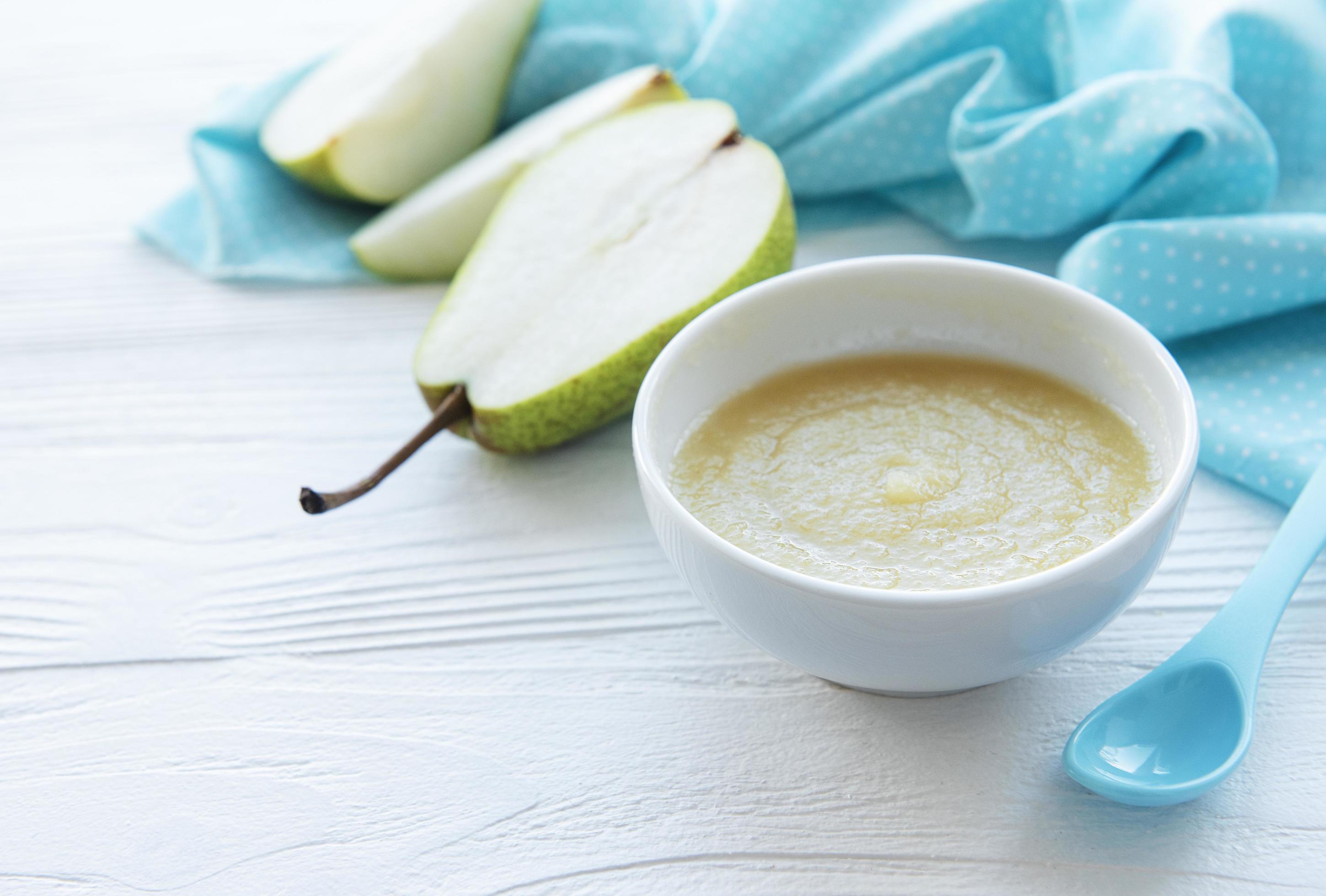 Bowl with fruit baby food and pears Stock Free