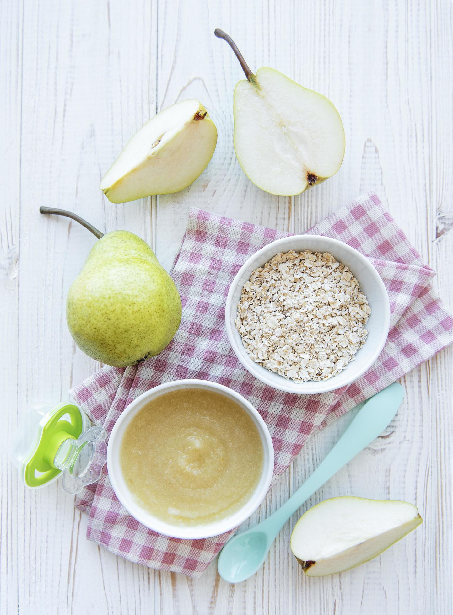 Bowl with fruit baby food and pears Stock Free