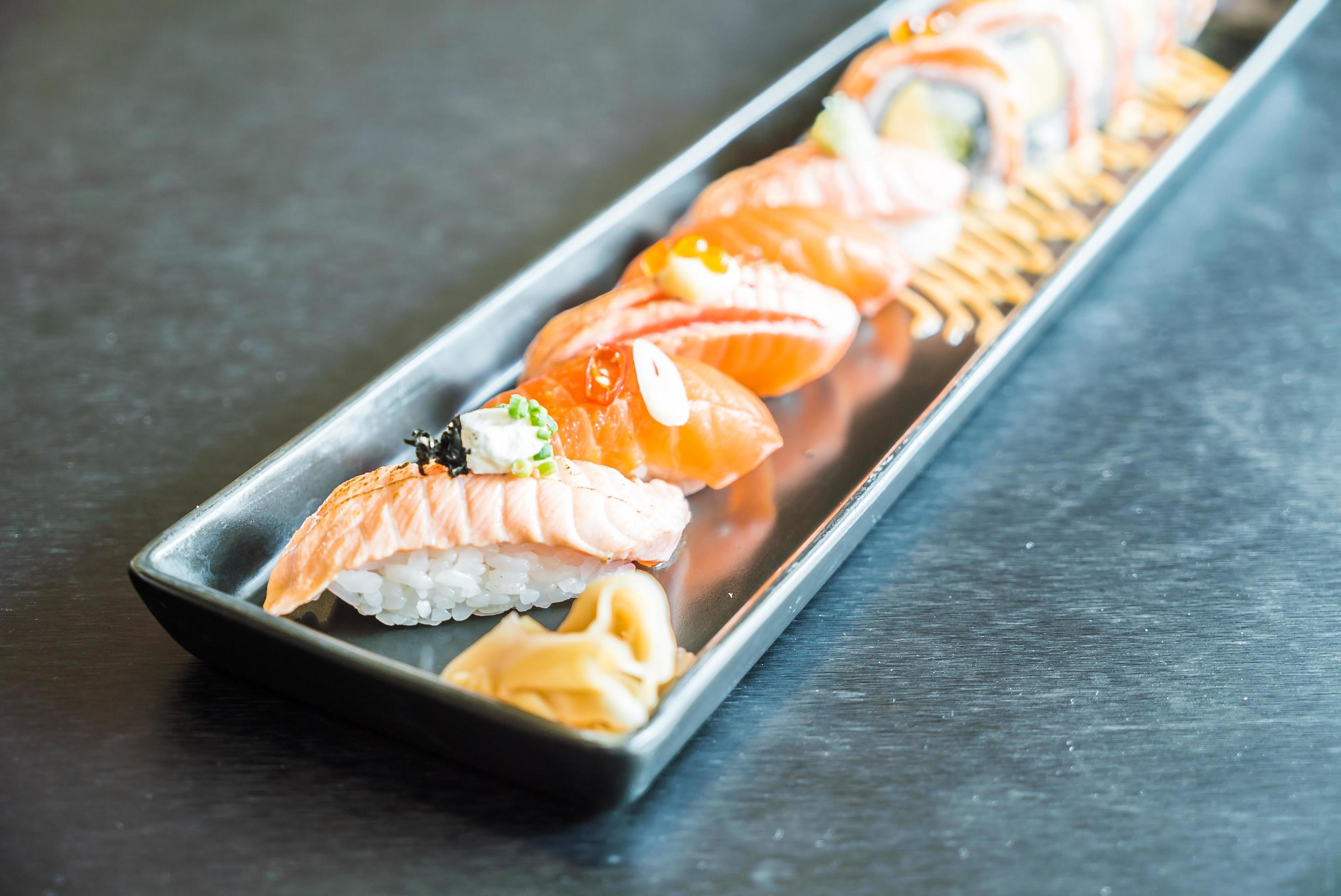 Salmon sushi roll, traditional Japanese food Stock Free