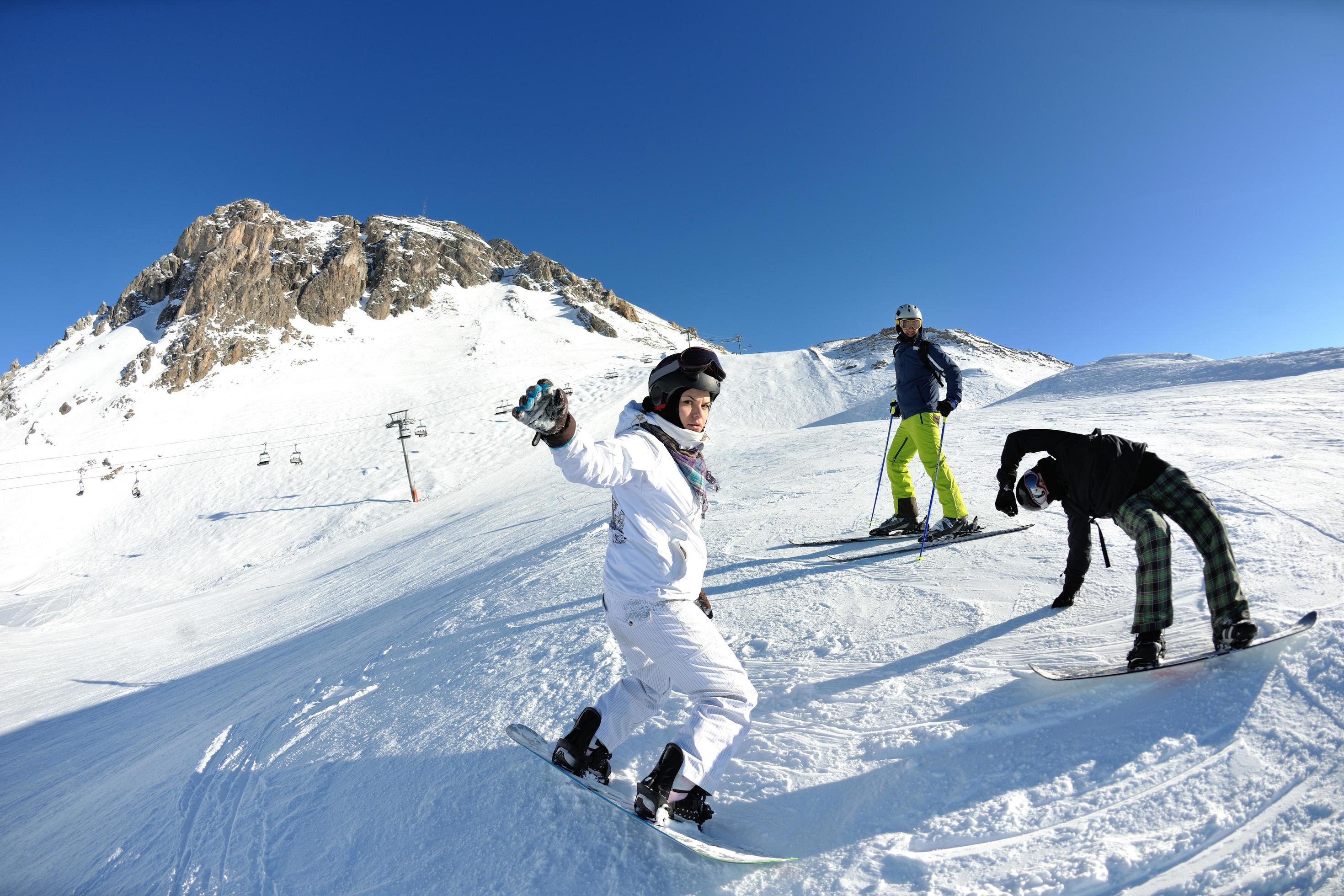 people group on snow at winter season Stock Free