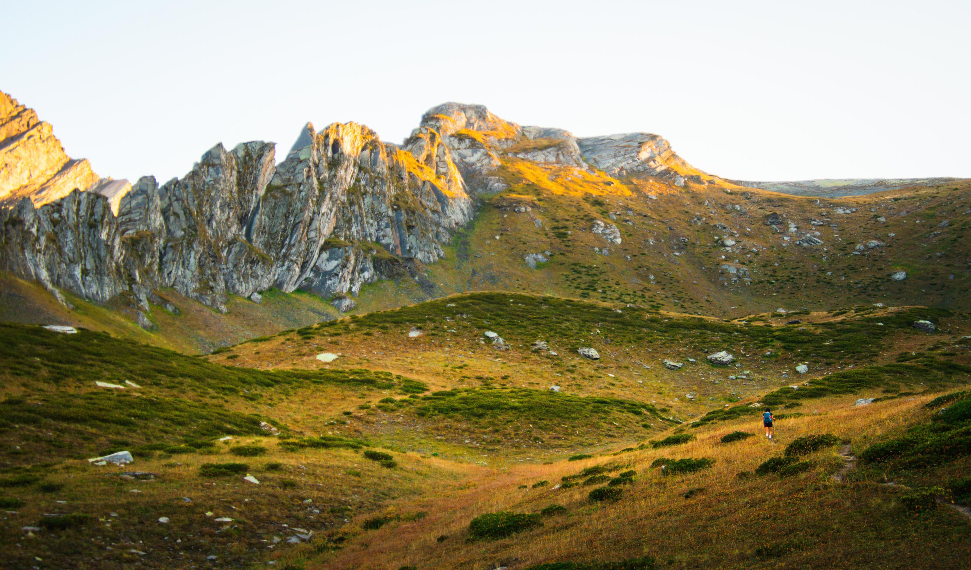 Hiker in mountains solo travel Stock Free