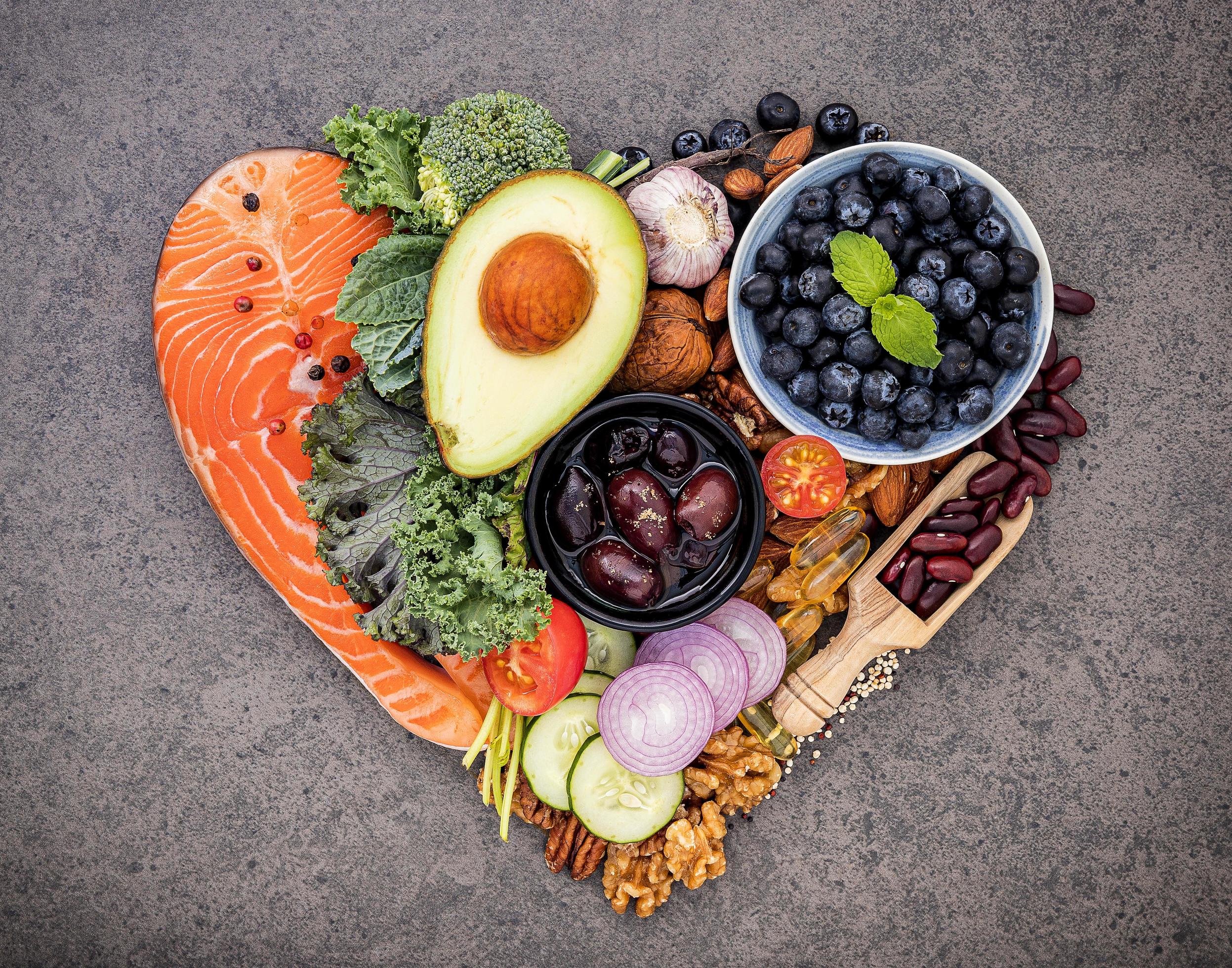 Healthy foods in a heart shape on slate Stock Free