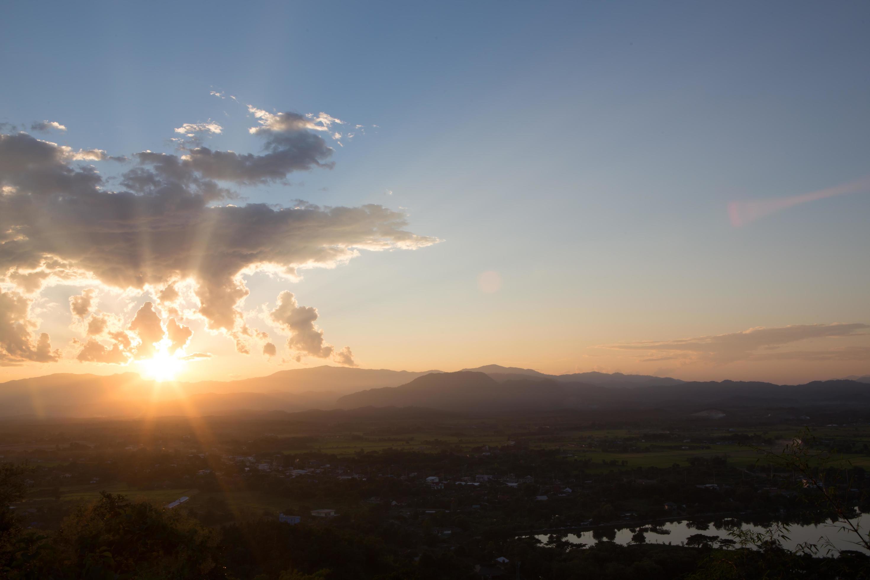 sunrise with clouds, light and rays Stock Free